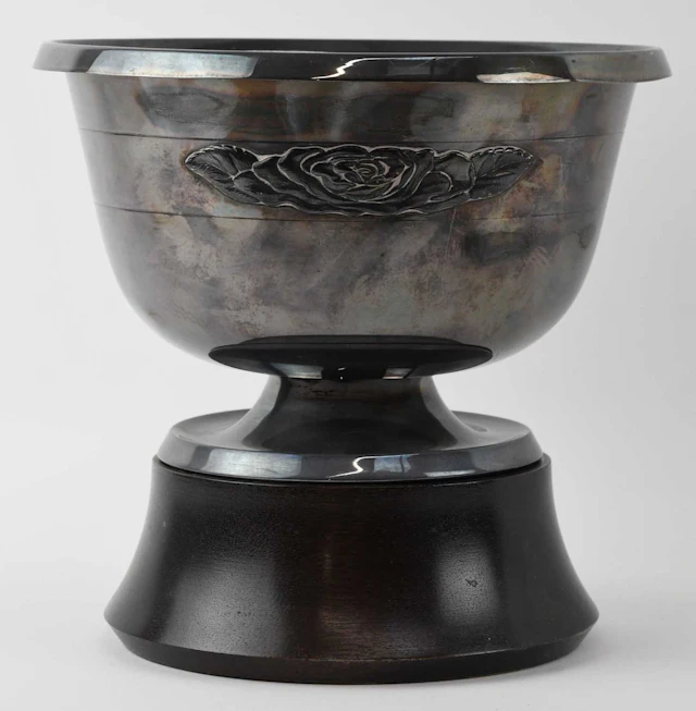 ALGERNON ASPREY LTD; a commemorative Elizabeth II hallmarked silver rose bowl