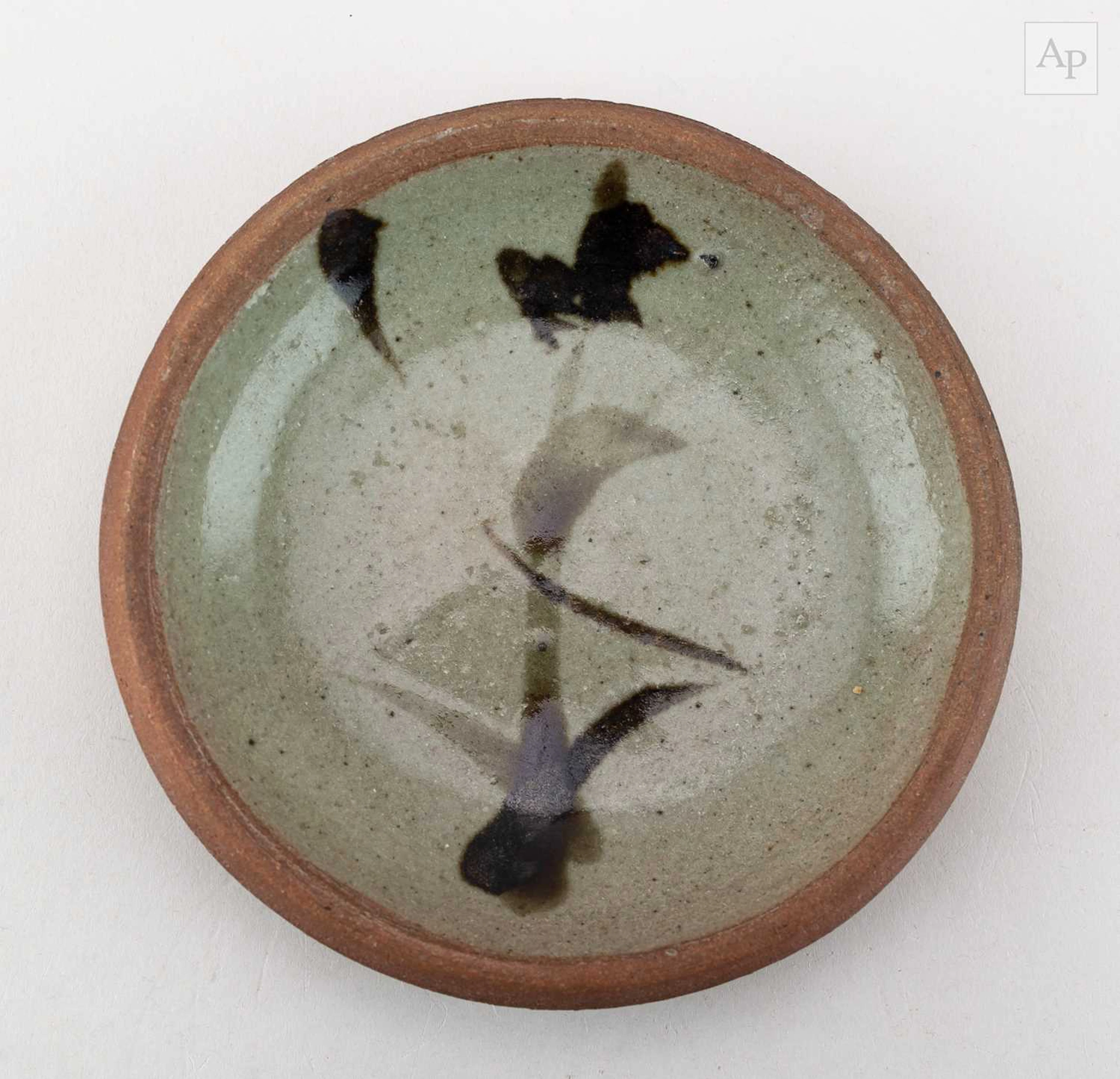 SHOJI HAMADA (1894-1978); a small stoneware dish...