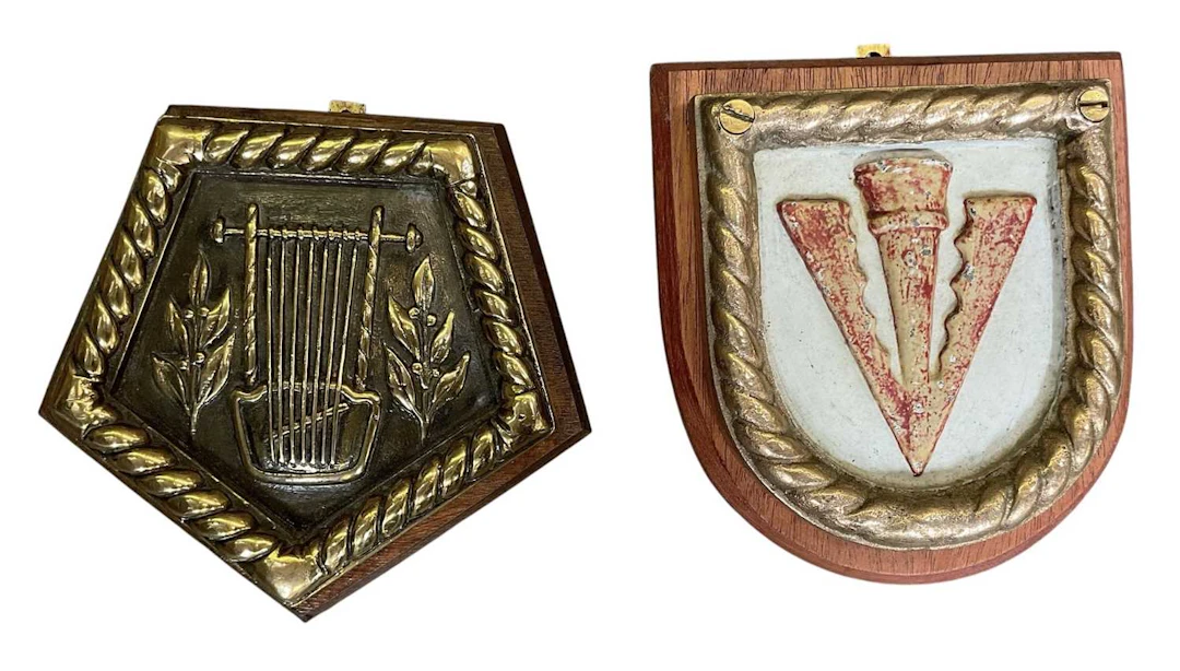 An early 20th century painted brass ship's name badge/plaque for 'HMS Wishart'
