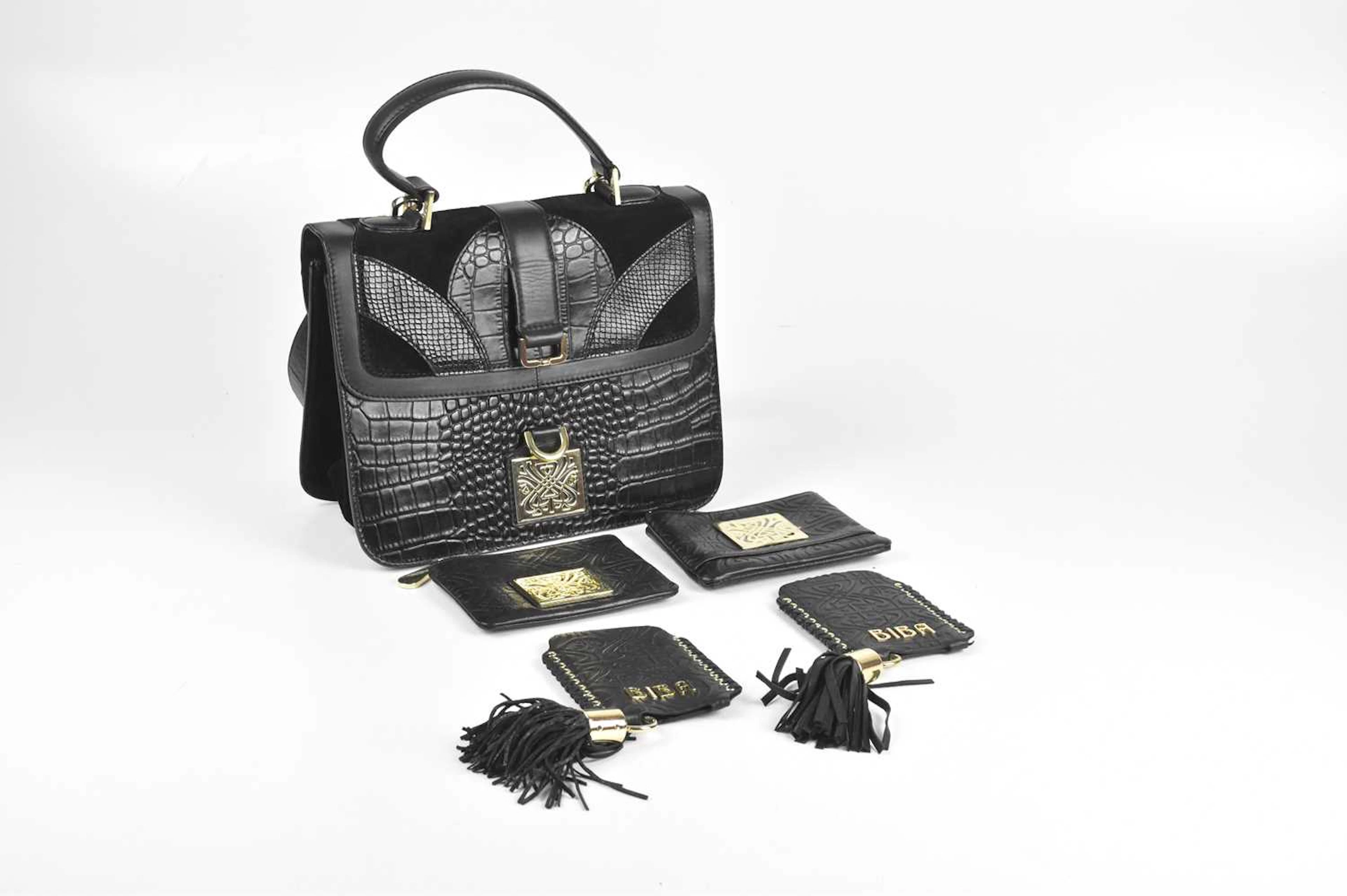 BIBA; a black embossed leather handbag