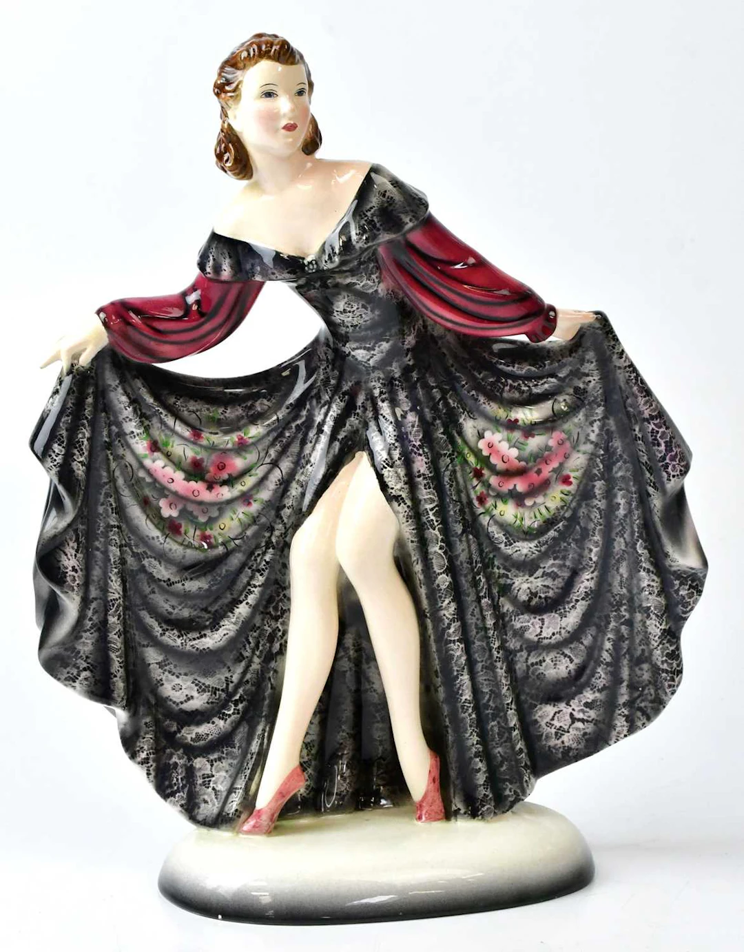 GOLDSCHEIDER; a porcelain figure of a young woman wearing...