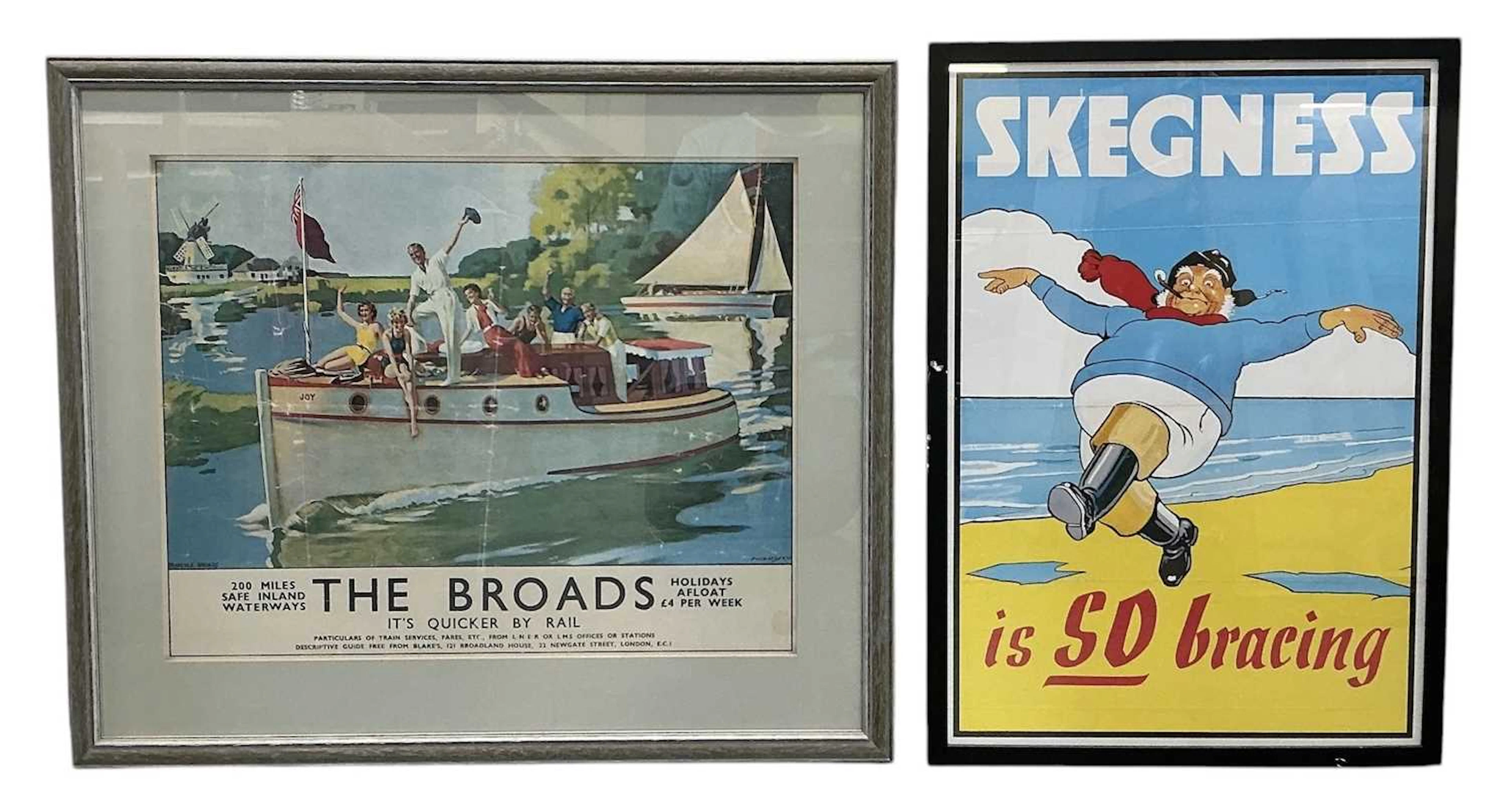 Two framed reproduction travel posters