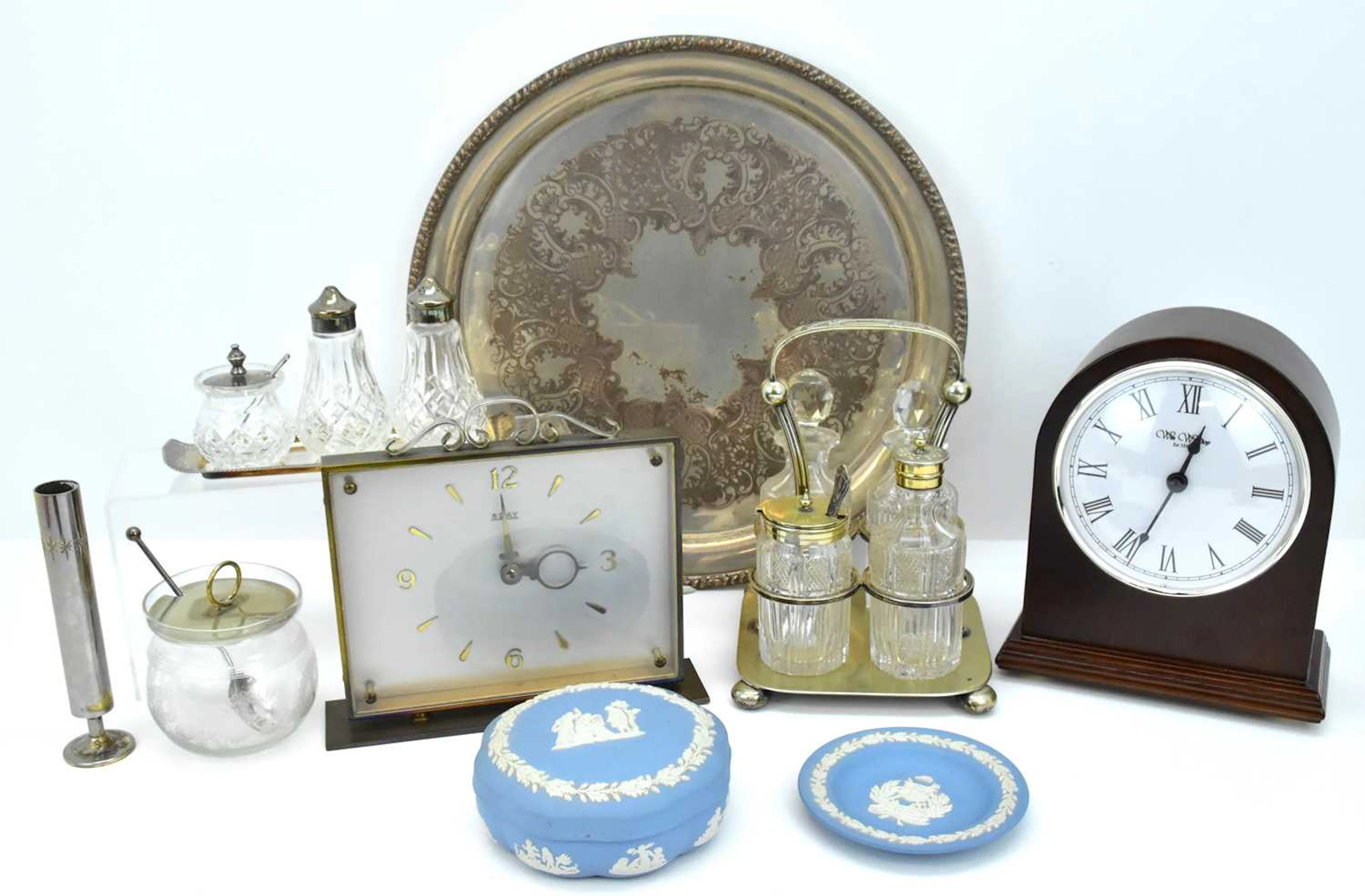 Various mixed collectibles including two table clocks