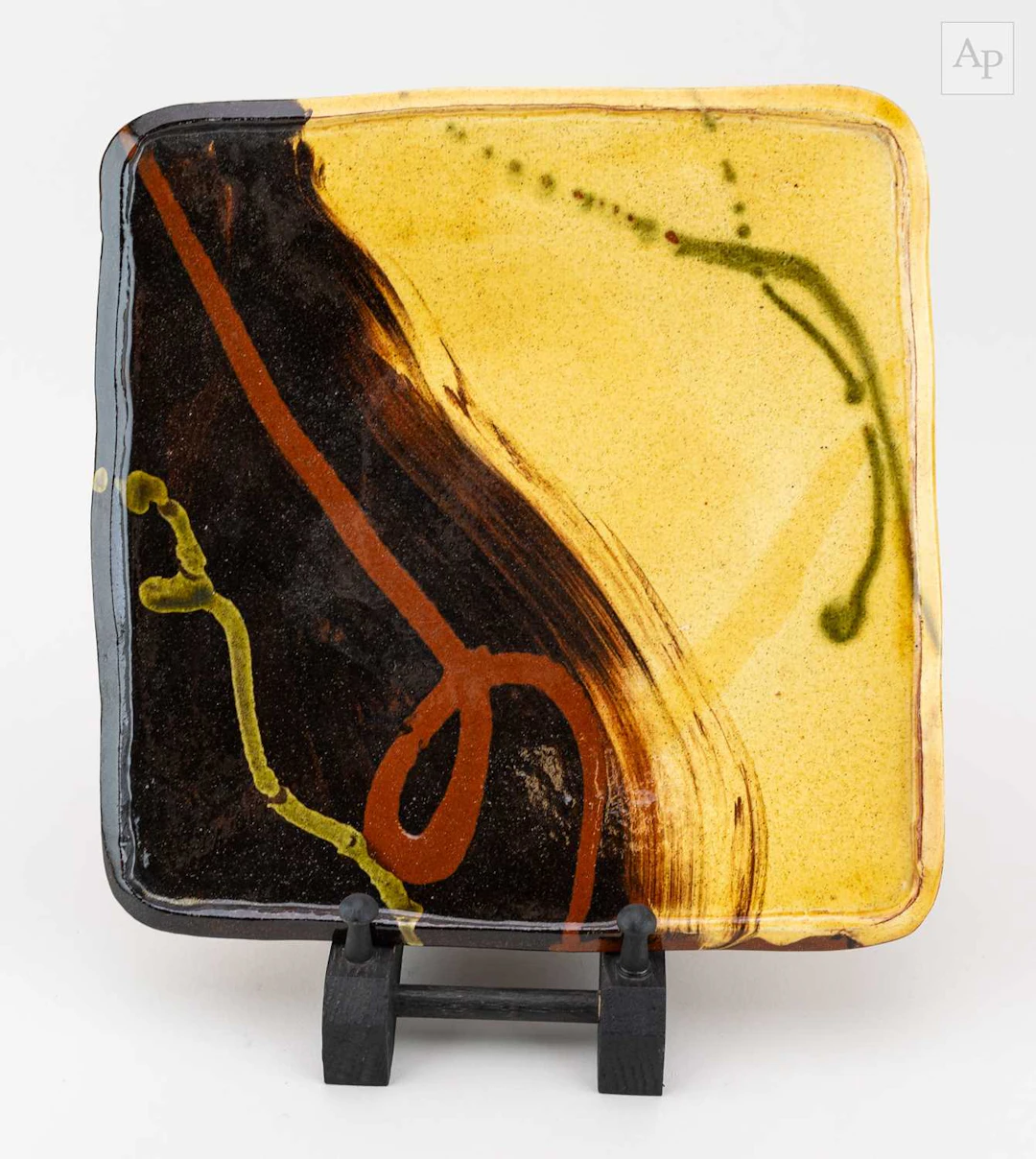CLIVE BOWEN (born 1943); a square slipware plate with...