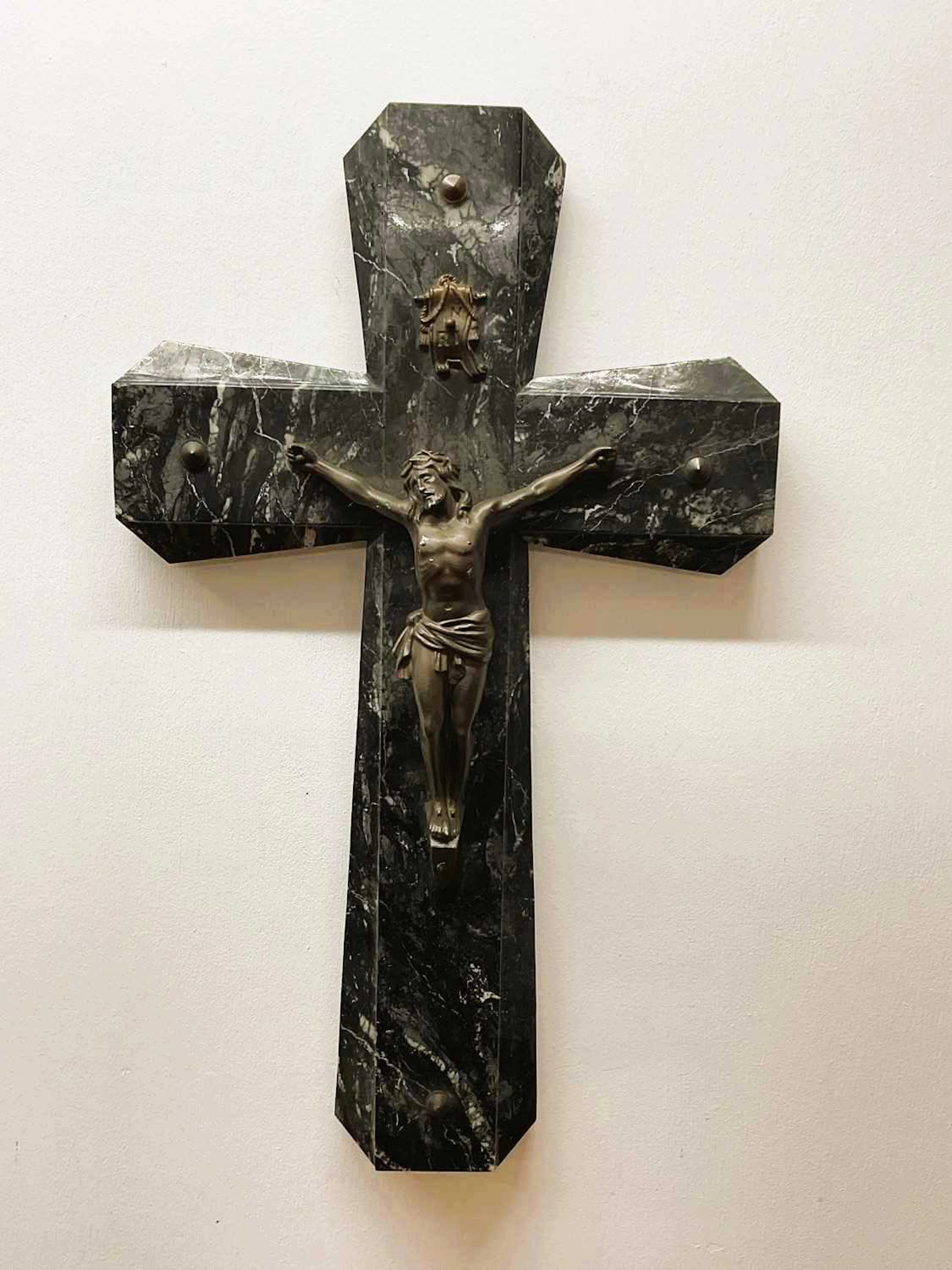A large marble crucifix with a gilt metal figure of Jesus