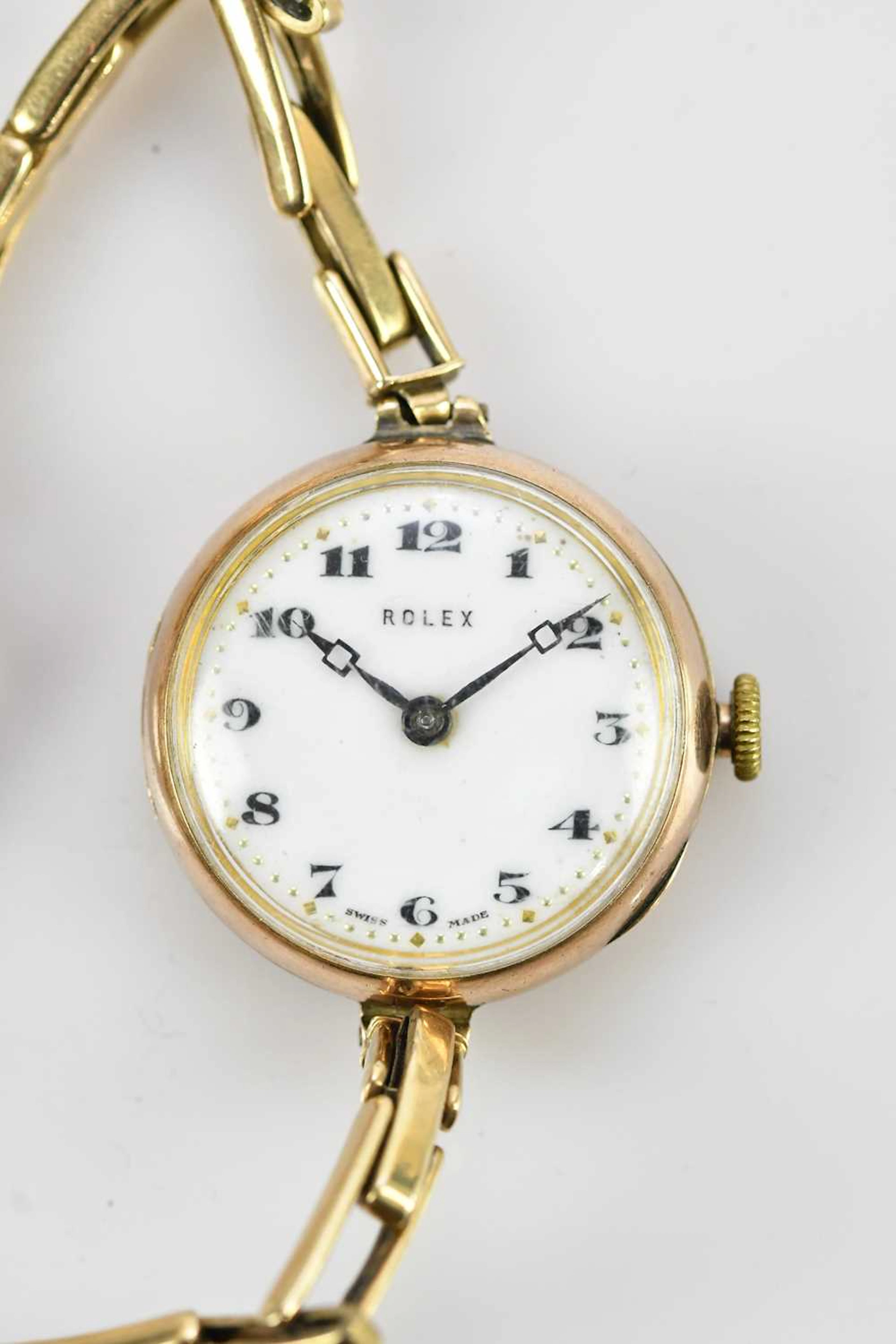 ROLEX; an Art Deco lady's yellow gold watch marked 375...