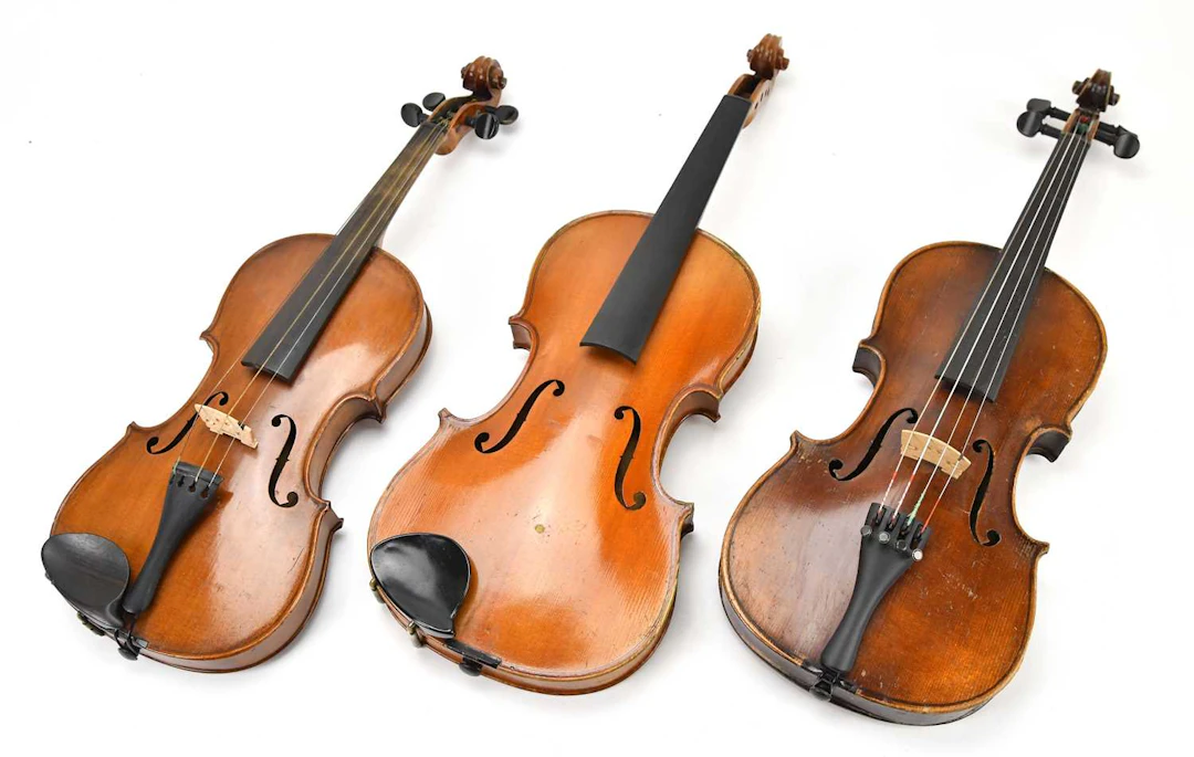 A three-quarter size violin labelled ‘The School Violin’