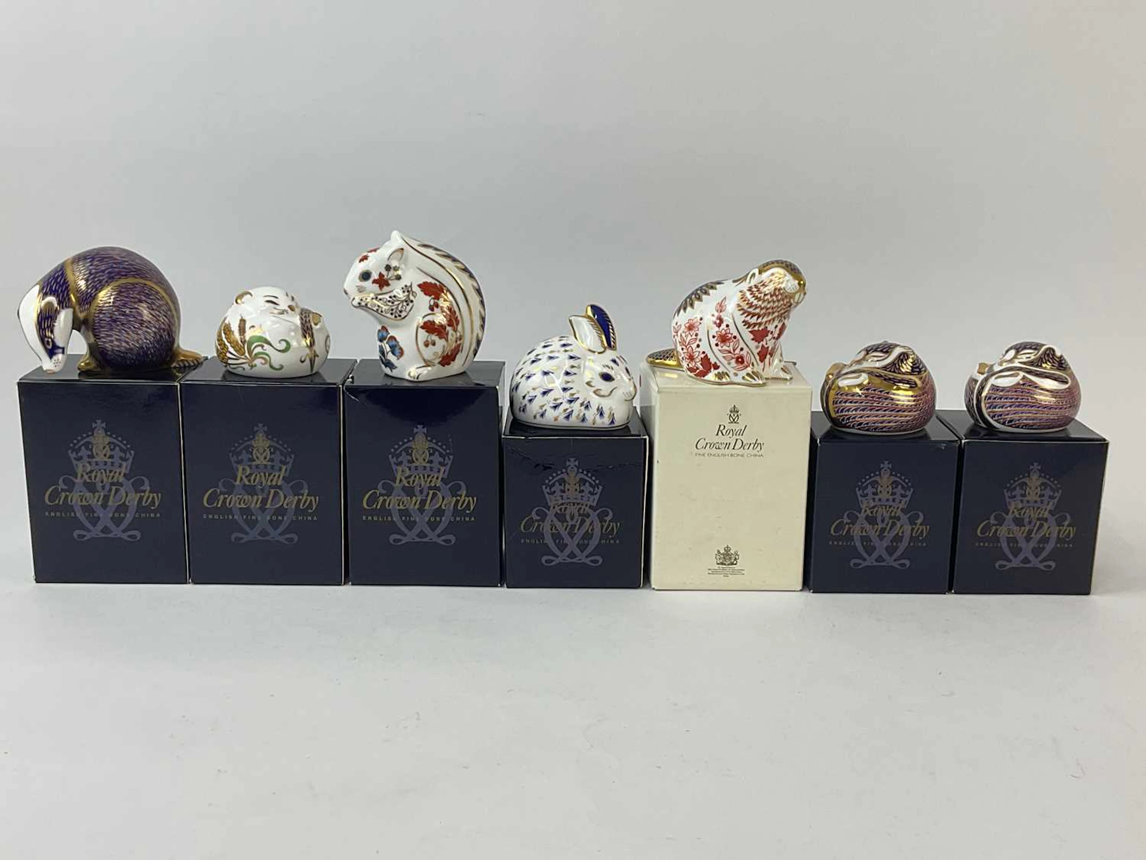 ROYAL CROWN DERBY; seven animal form paperweights