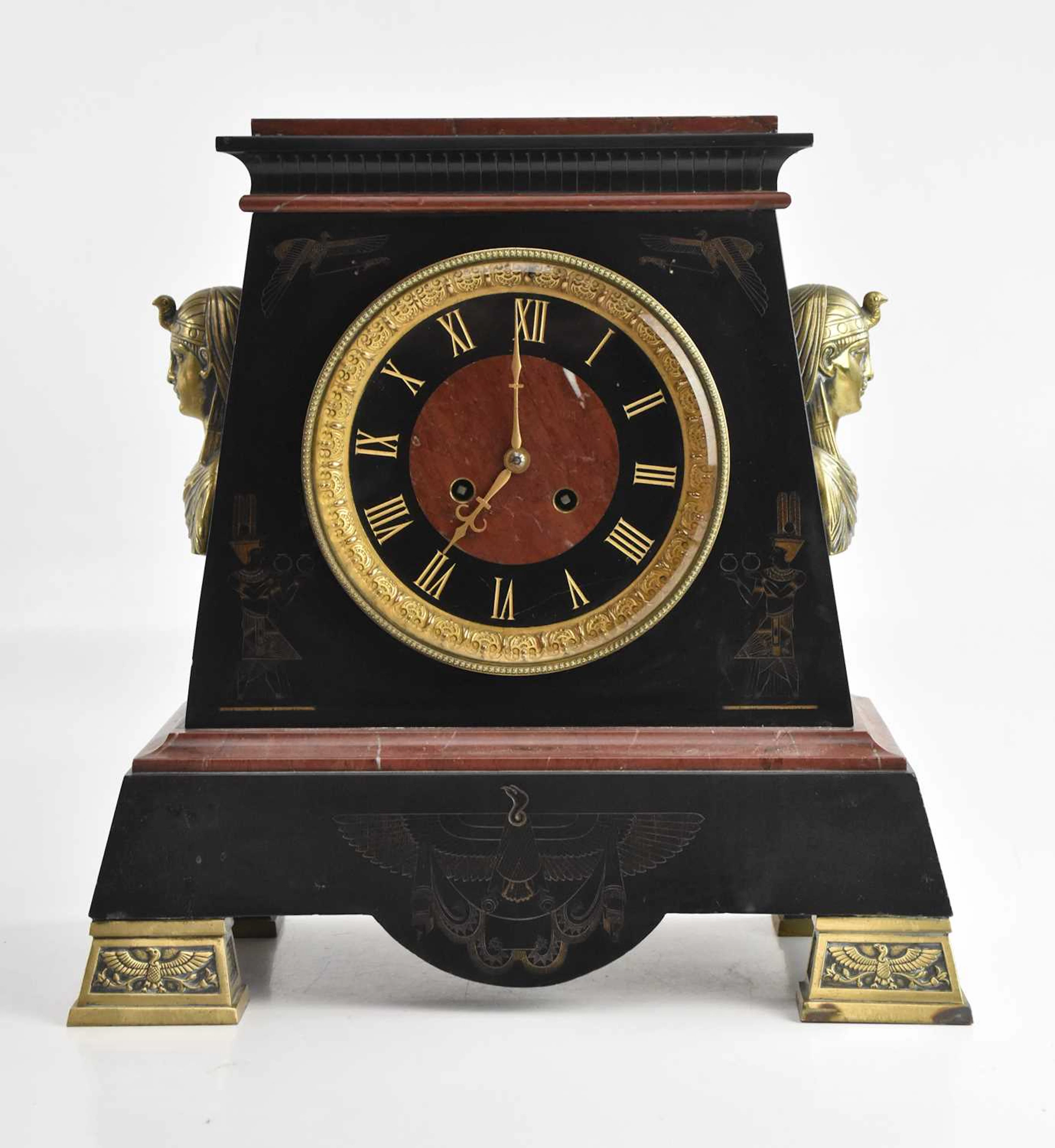 A late 19th century French black slate Egyptian Revival...