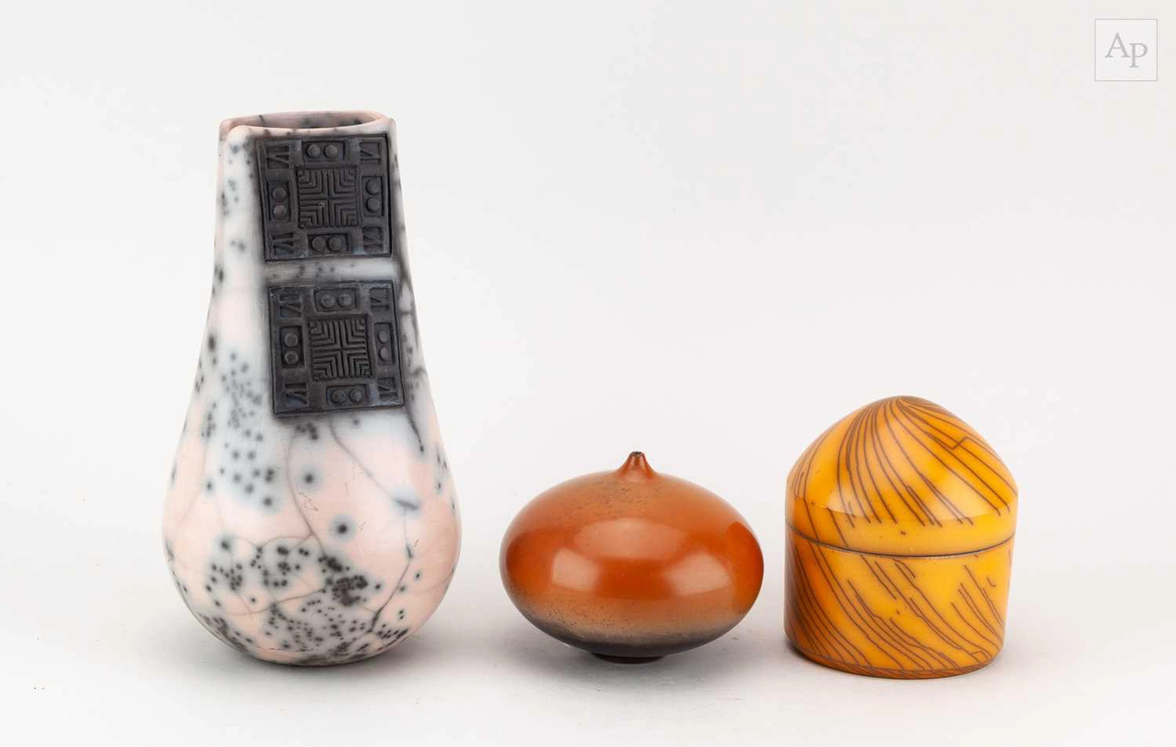 JACQUI ATKIN; a smoke fired and burnished raku vessel...