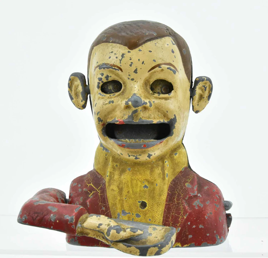 A rare Archie Andrews mechanical coin bank