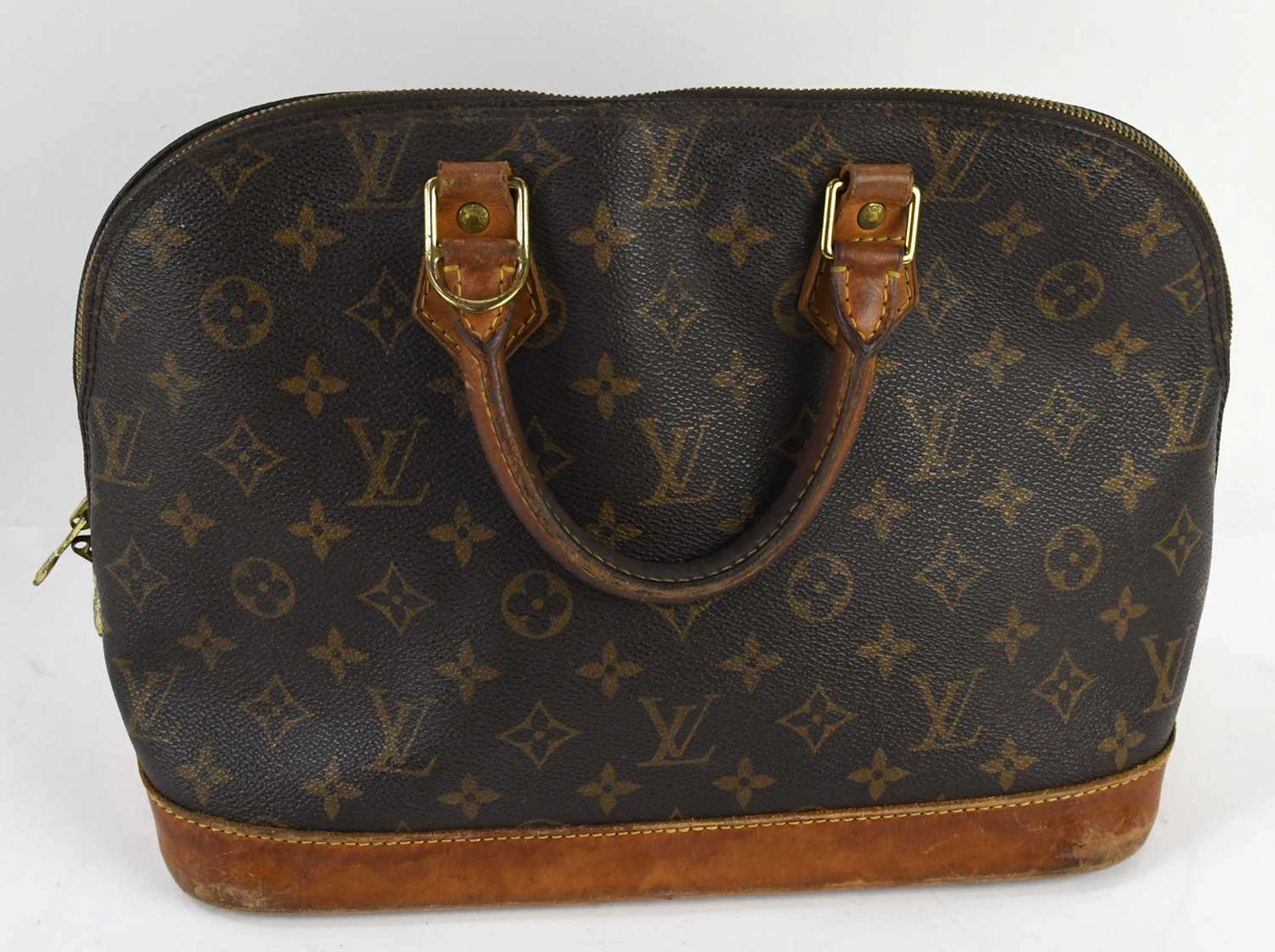 LOUIS VUITTON; a vintage brown monogram leather 'Alma PM' handbag
