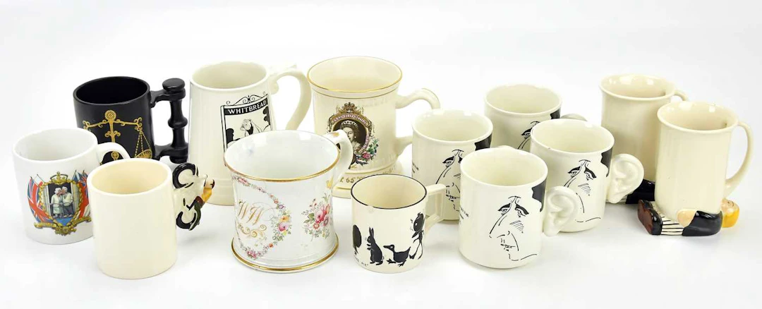 CARLTON WARE; a collection of decorative and commemorative mugs