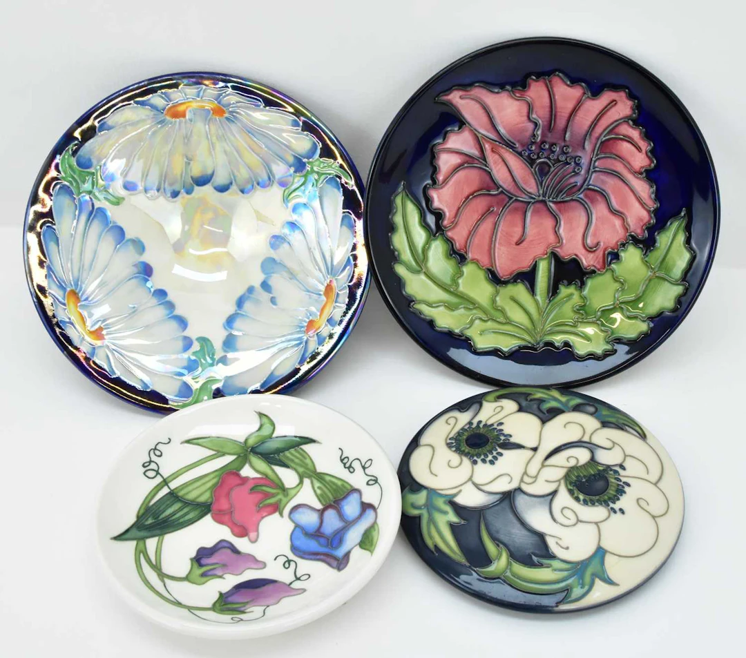 MOORCROFT; three items of pottery comprising a...