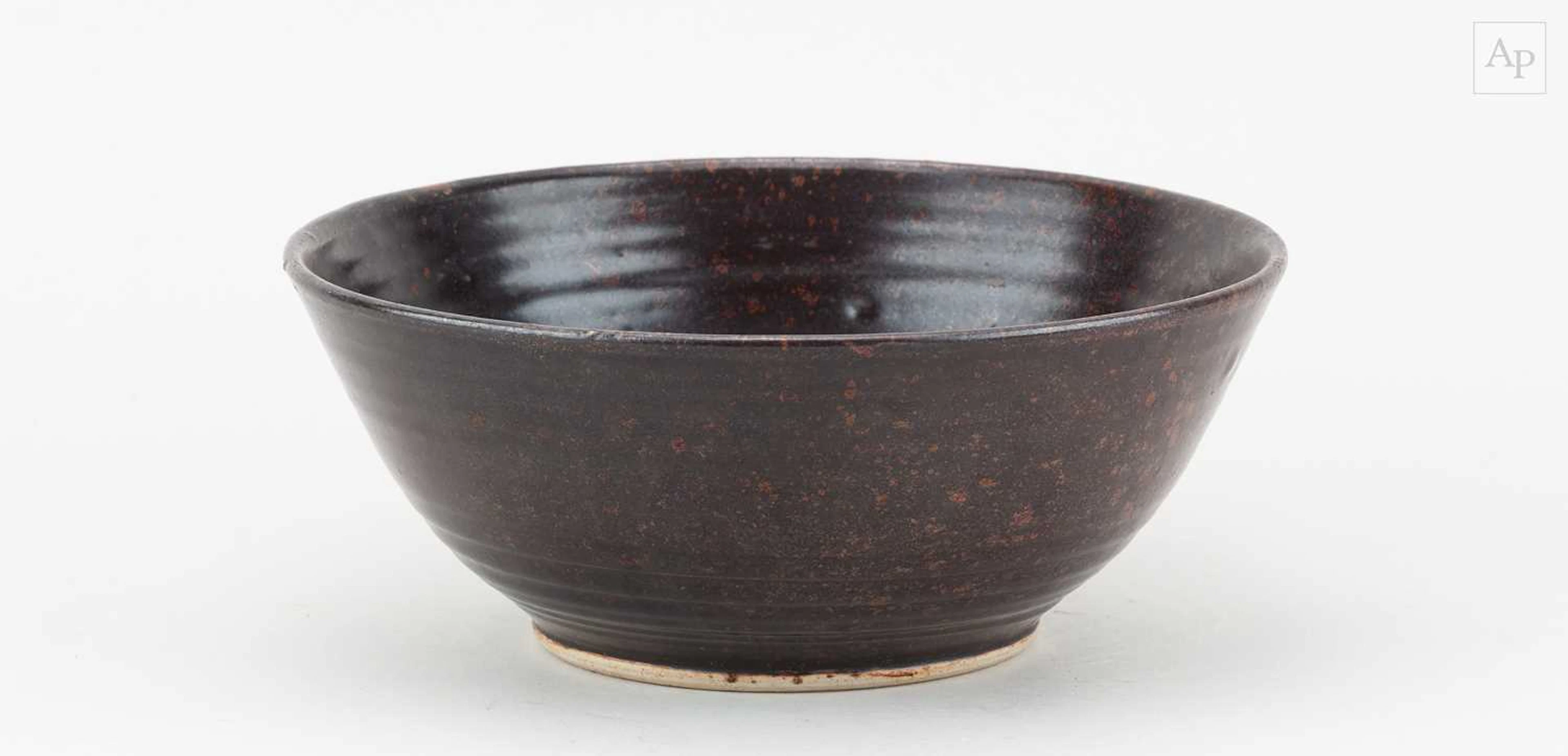 DAN ARBEID (1928-2010); a small stoneware bowl covered in...
