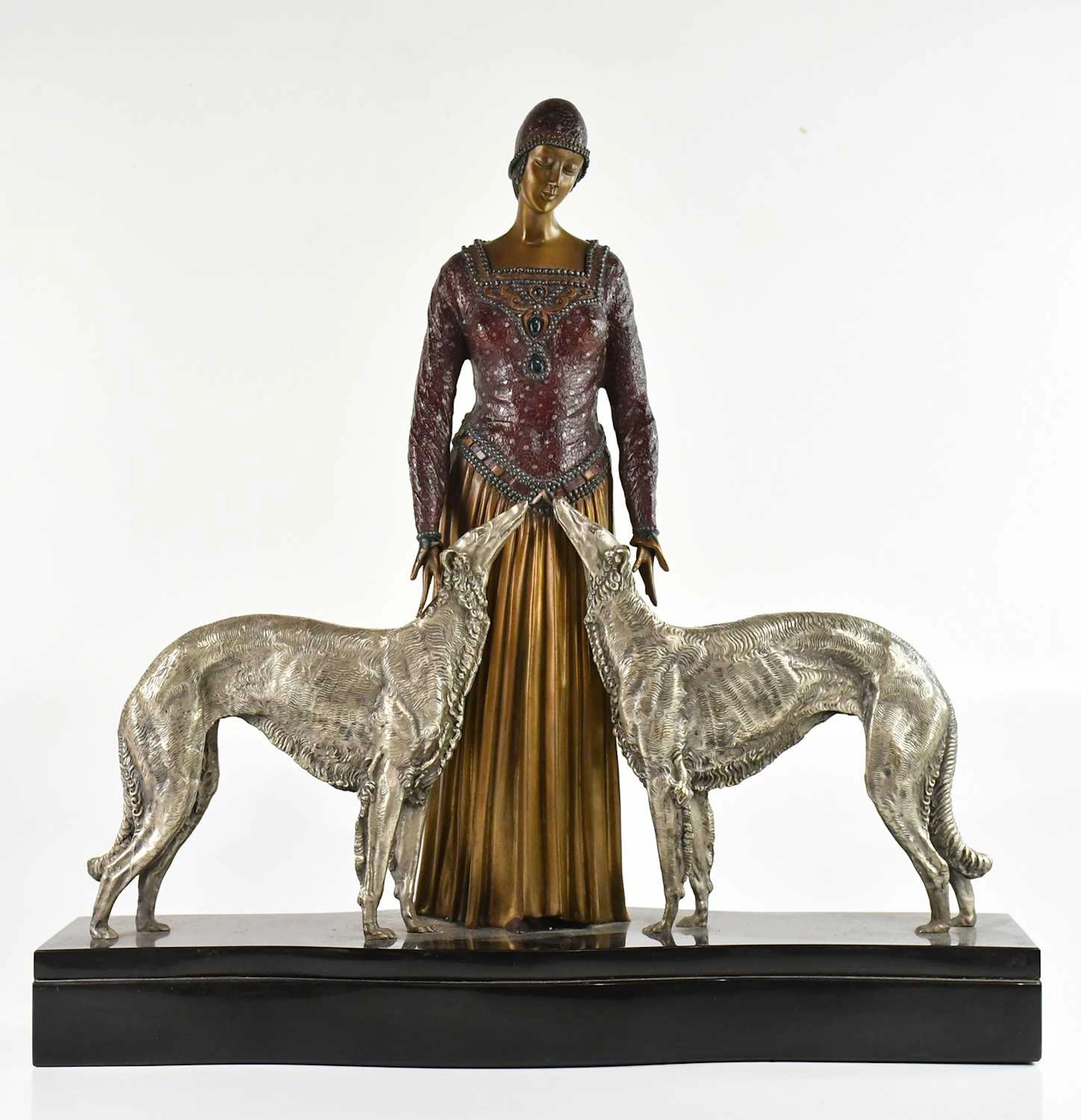 AFTER DEMETRE CHIPARUS; an Art Deco style figure group...