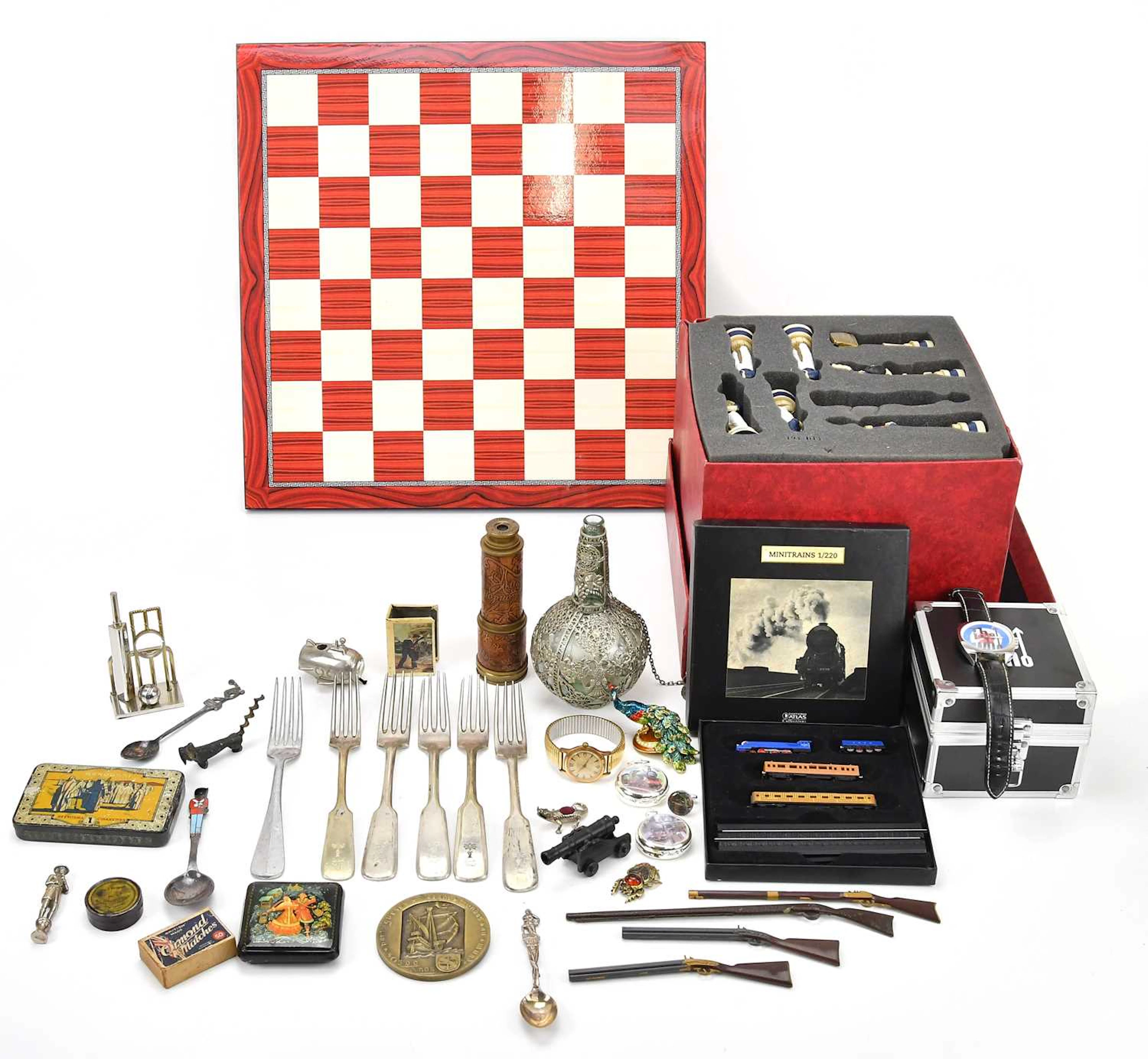 A group of collectors' items including old plated cutlery