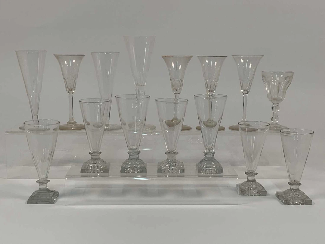 A quantity of Georgian square base dwarf ale glasses