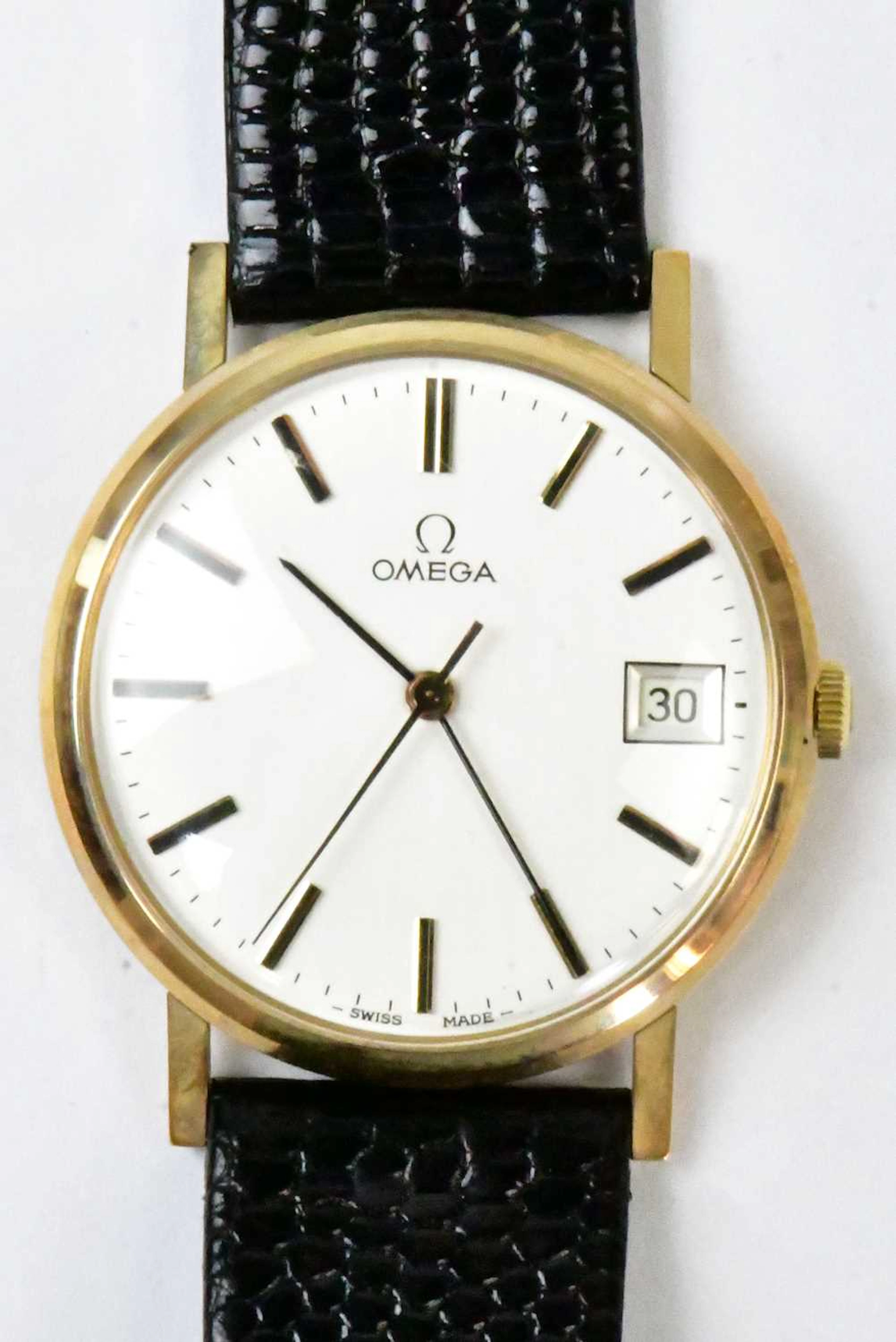 OMEGA; a gold-plated presentation watch