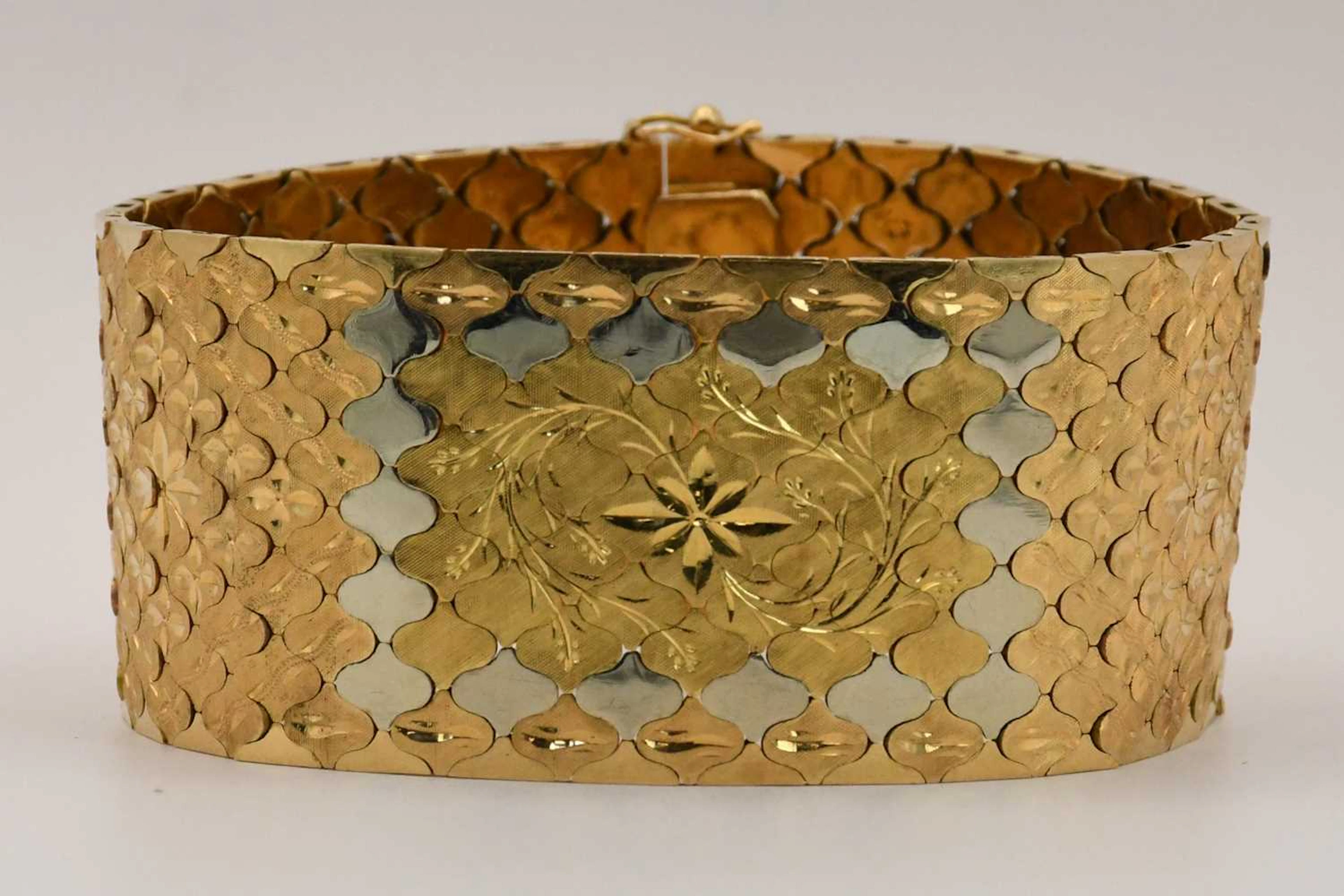 A substantial 18ct yellow and white gold cuff bracelet