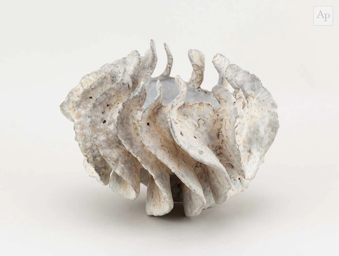 BEVERLEY BELL-HUGHES (born 1948); a stoneware sculptural...