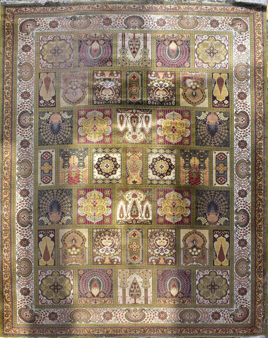 A Persian Bakhtiari style carpet/rug in the garden panel design in green