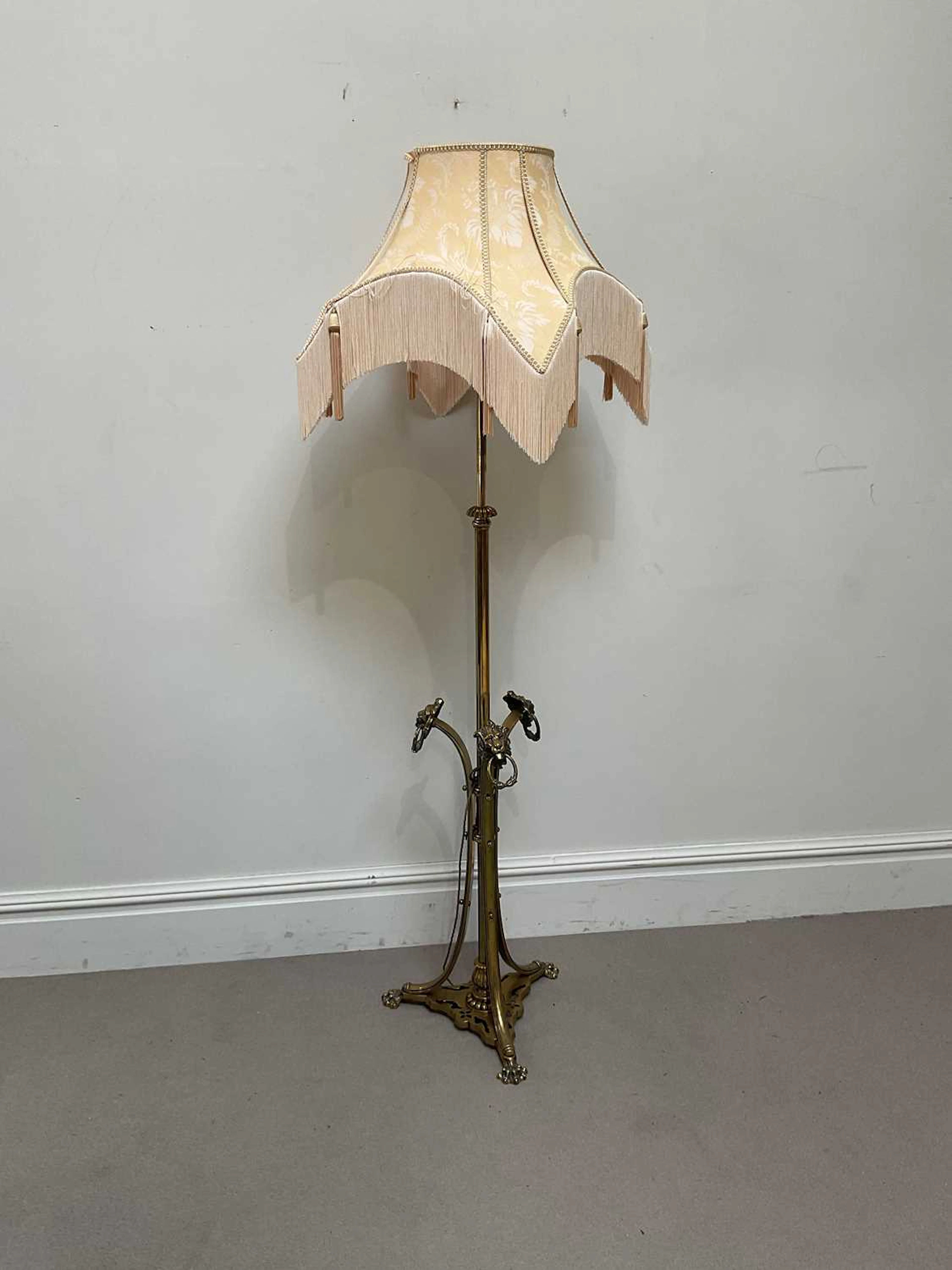 A good Victorian brass adjustable standard lamp