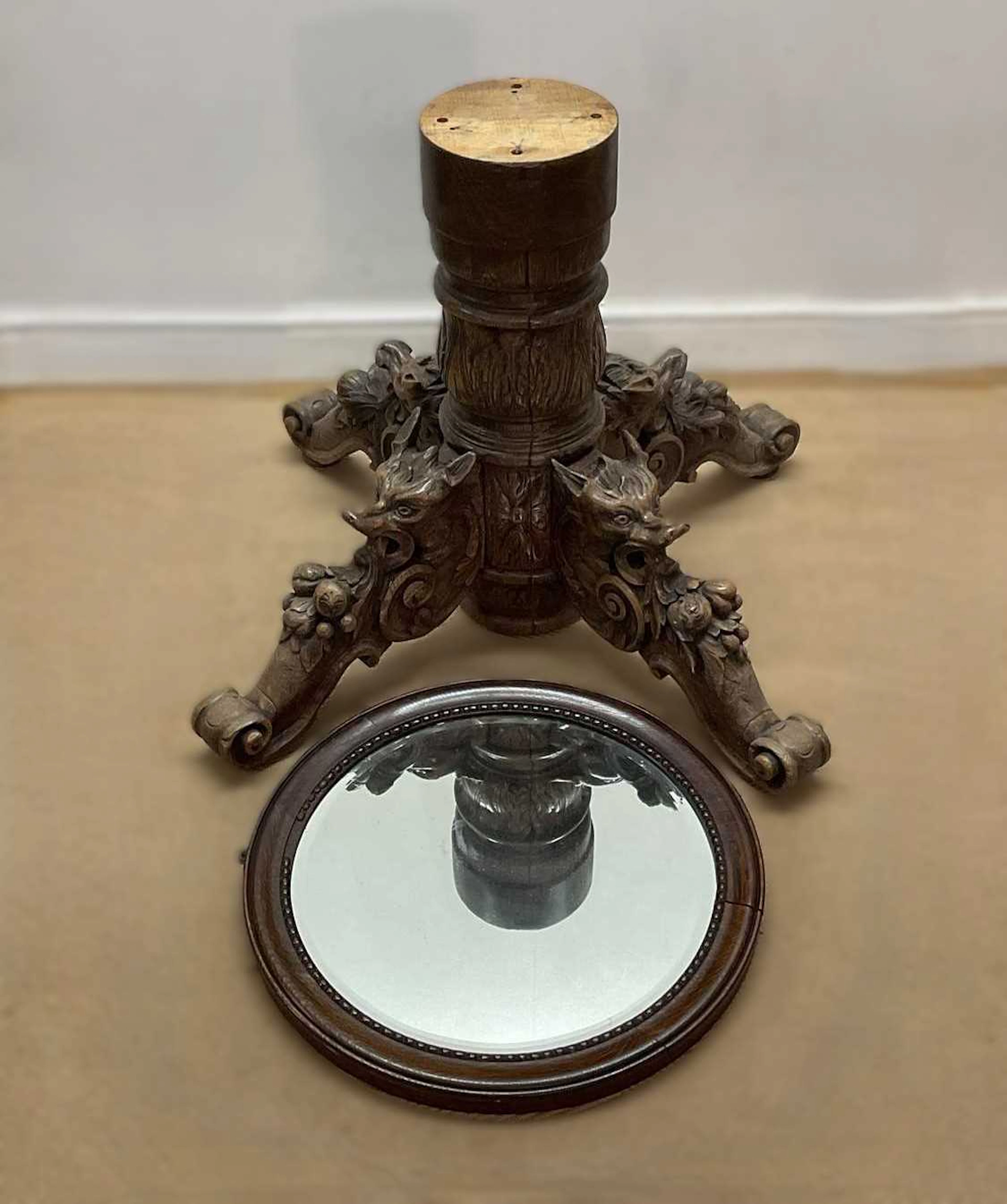 A 19th century French oak hunting table pedestal