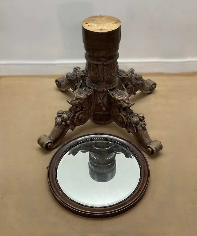 A 19th century French oak hunting table pedestal