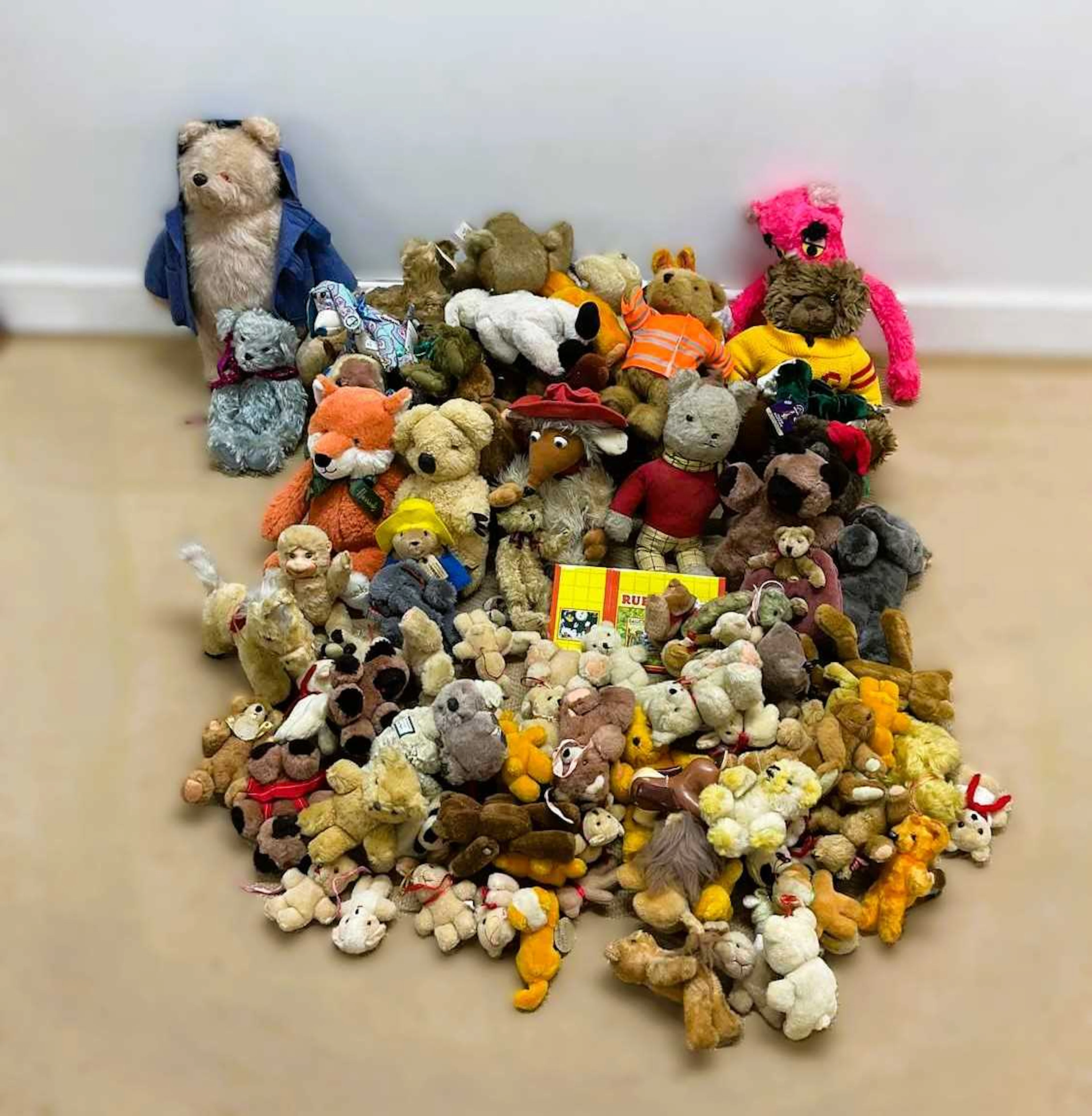 A large quantity of vintage and modern teddy bears and soft toys