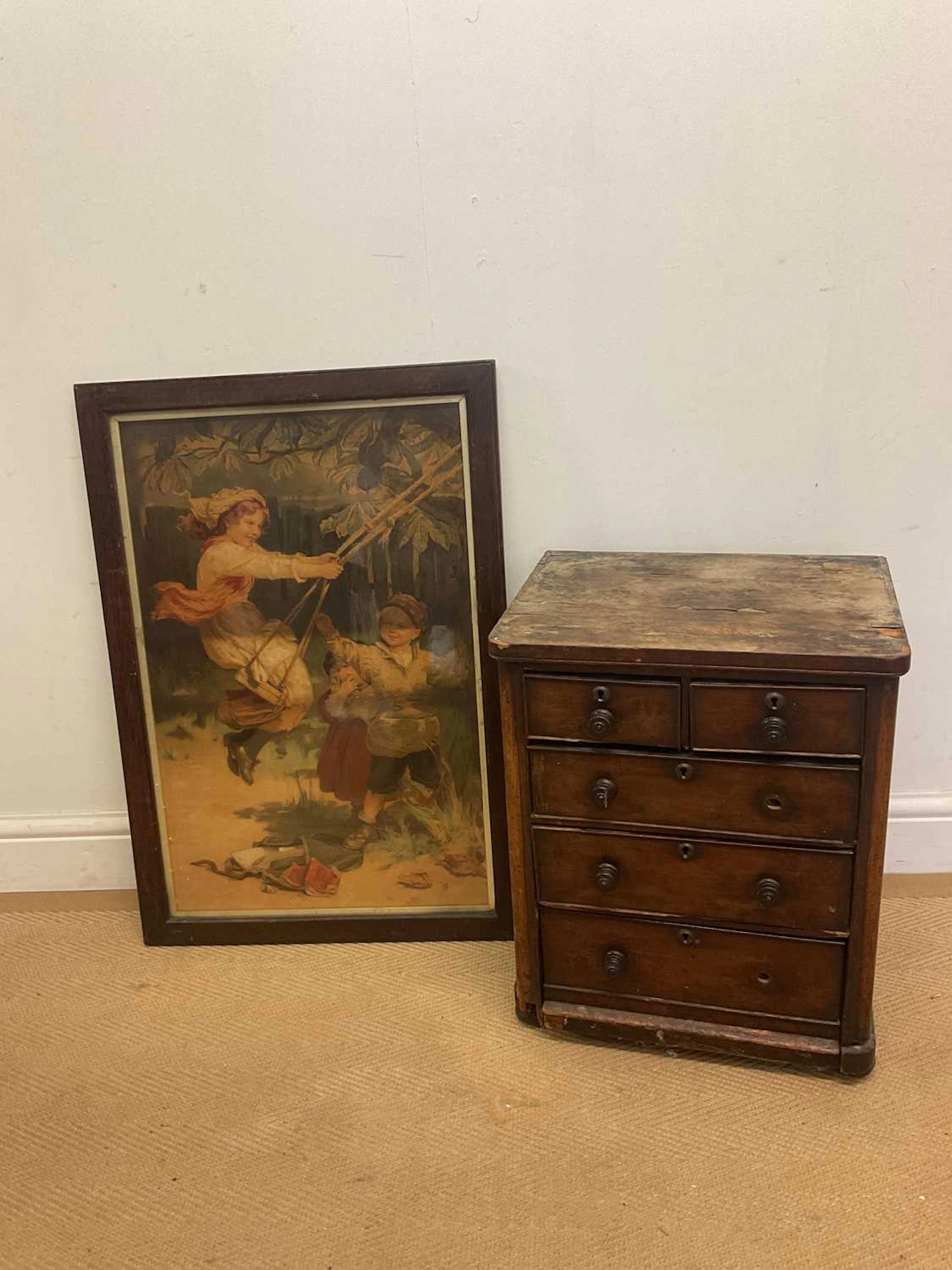 Apprentice style small mahogany chest; two small over three long