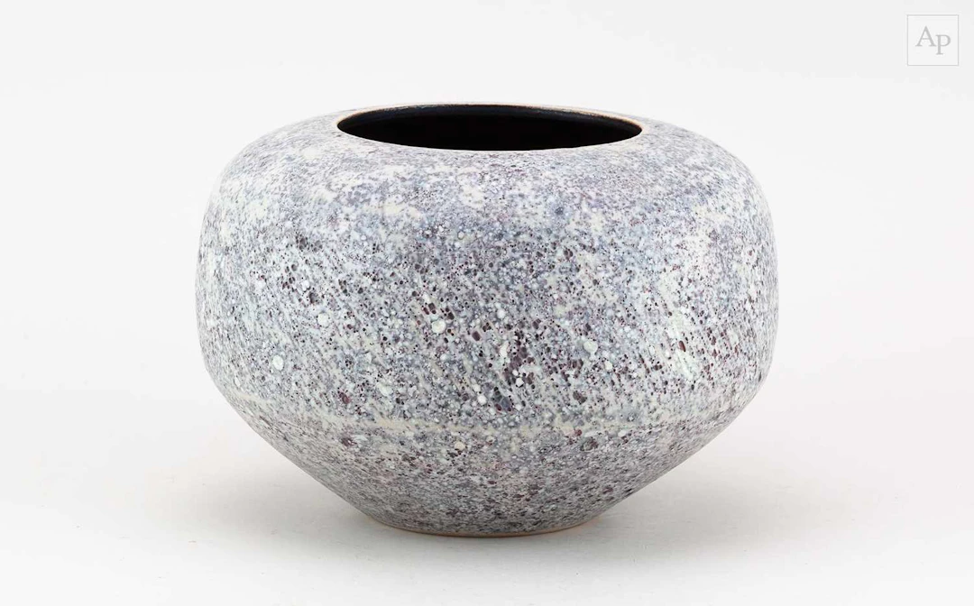 CHRIS CARTER (born 1945); a stoneware quern vessel with...