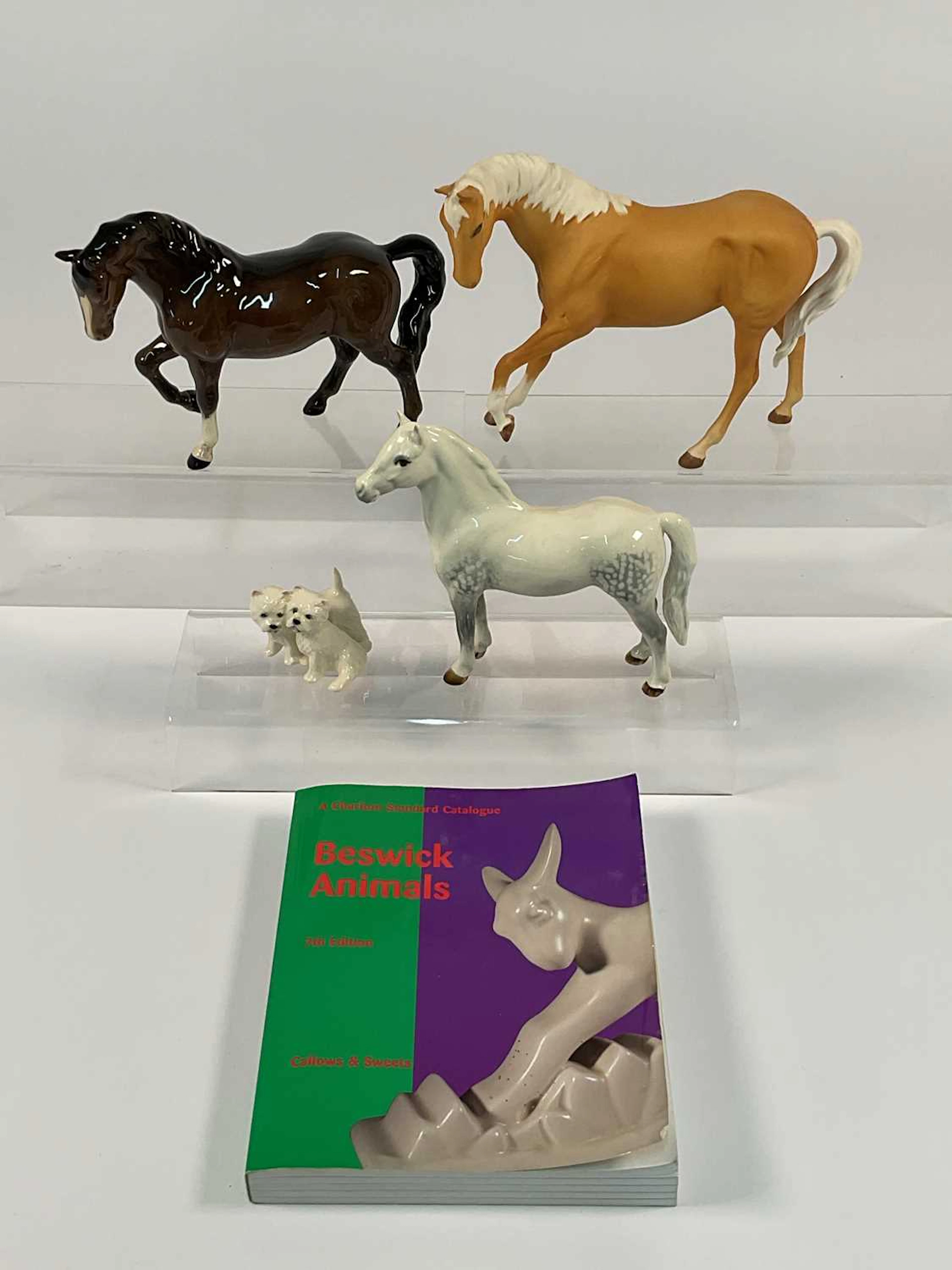 BESWICK; three ceramic models of horses