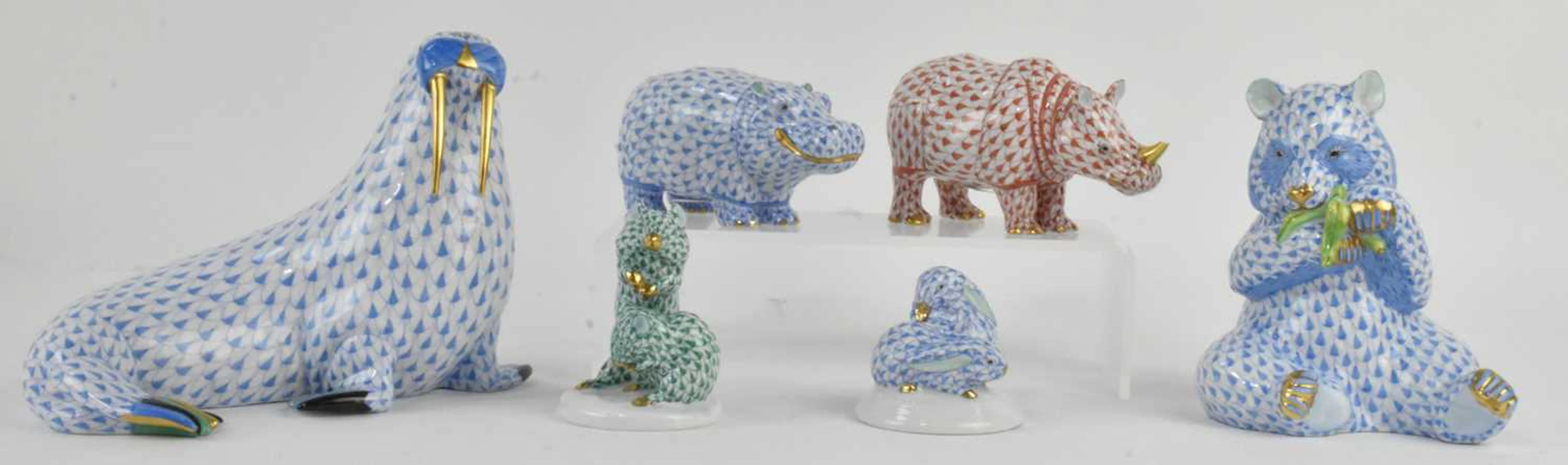 HEREND; six assorted Hungarian hand painted porcelain figures comprising walrus