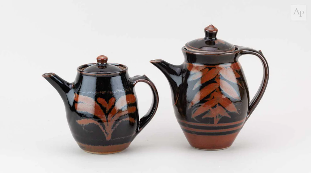 DEREK EMMS (1929-2004); a stoneware coffee pot covered in...