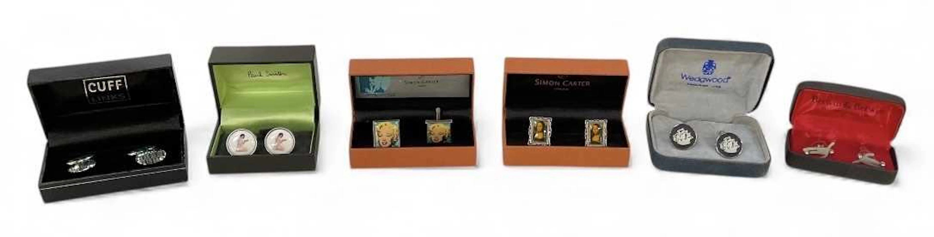 Six pairs of cased decorative cufflinks including Paul Smith