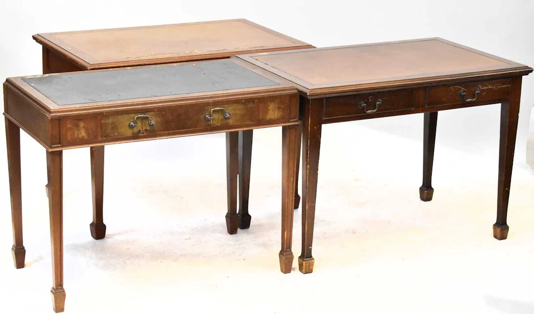 Two similar Edwardian mahogany side tables