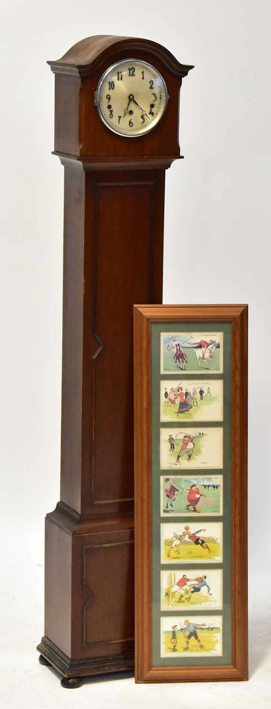 A Georgian-style mahogany grandmother clock