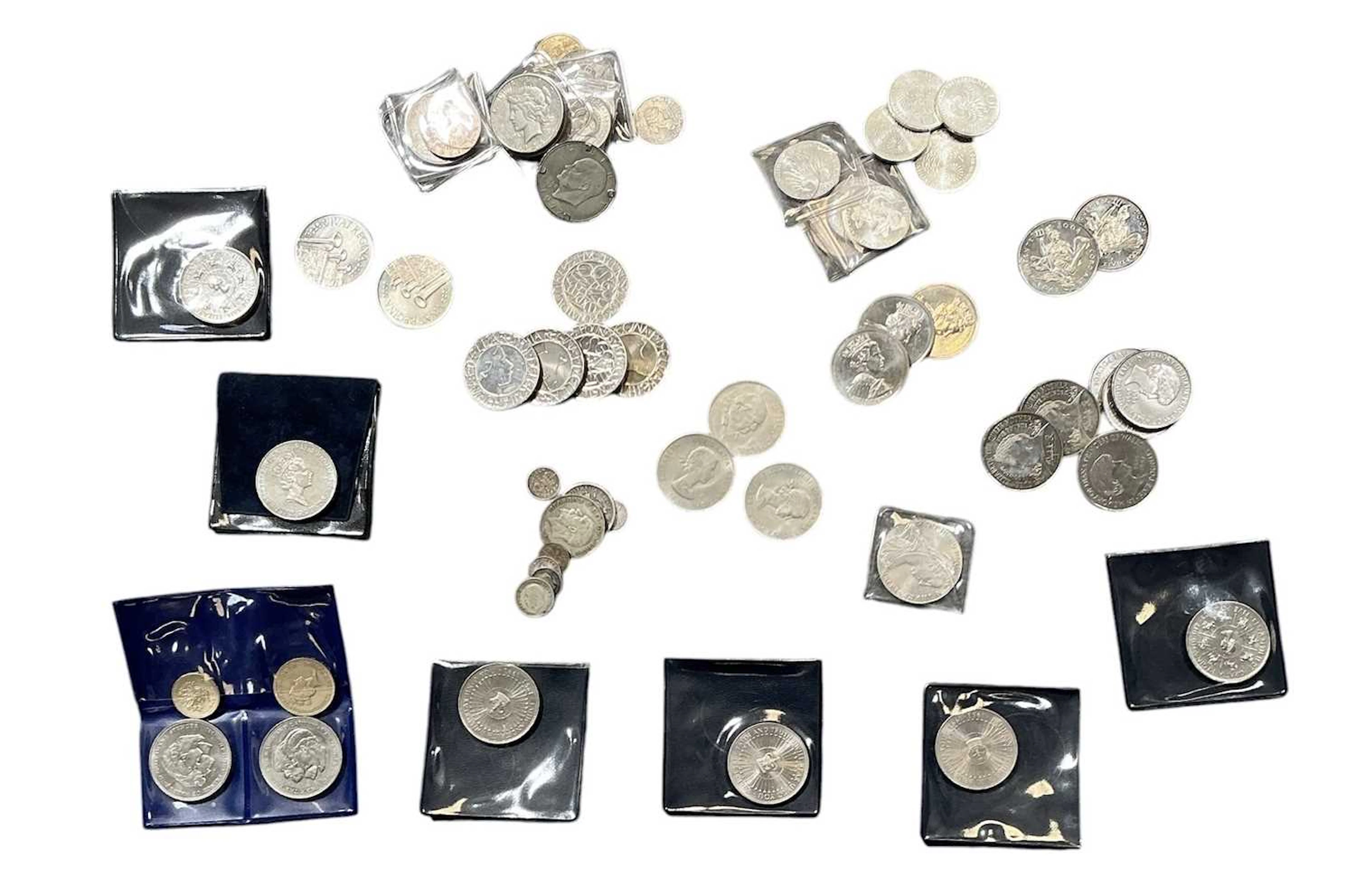 A collection of assorted GB commemorative £5 and other coins
