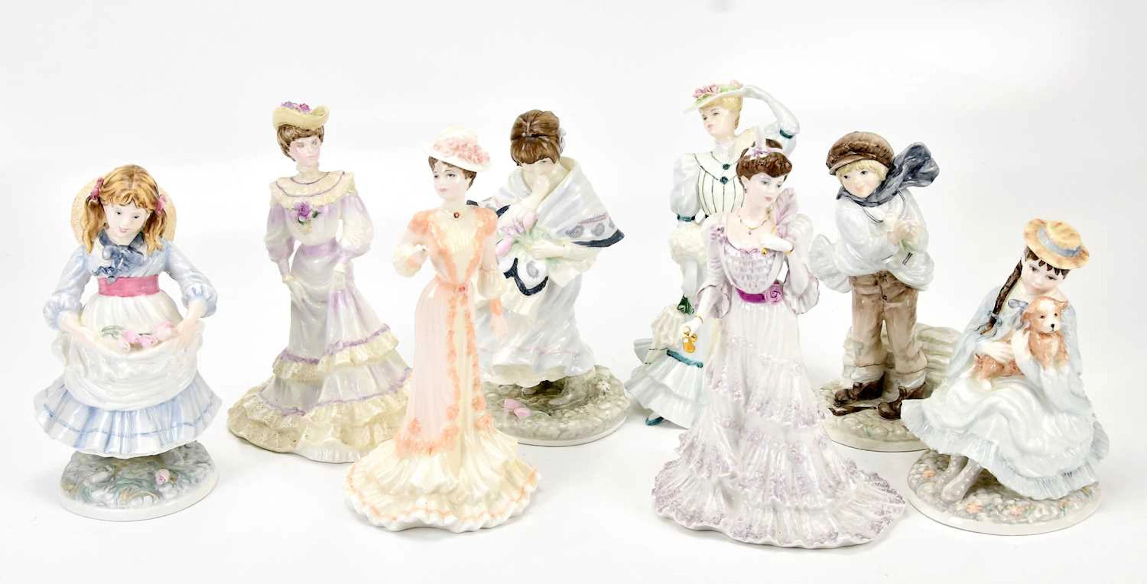COALPORT; a collection of ceramic figures including...