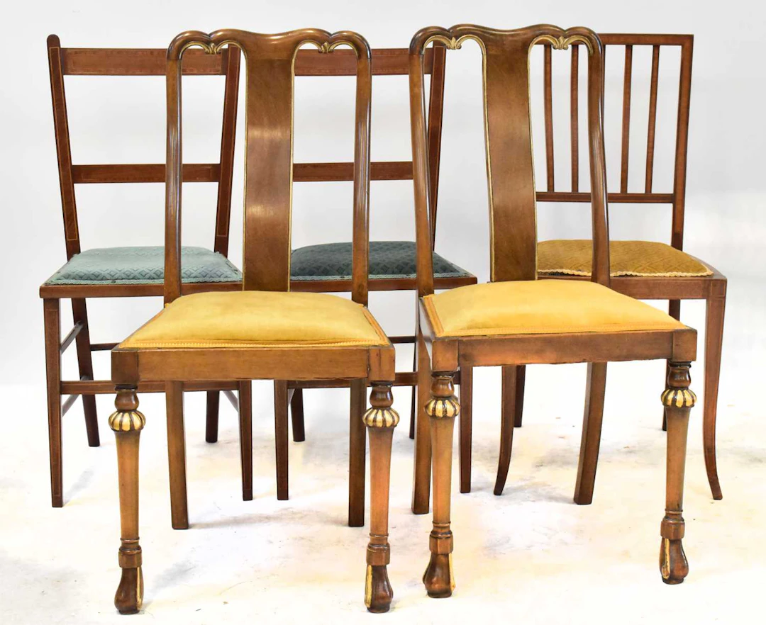 A pair of Edwardian inlaid bedroom chairs