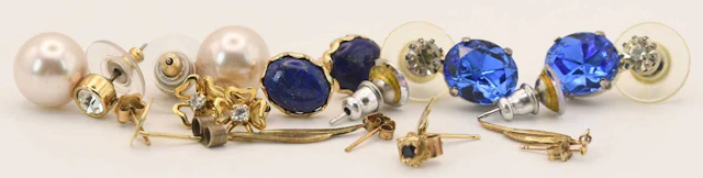 Various earrings including a pair of 18ct yellow gold diamond set floral studs
