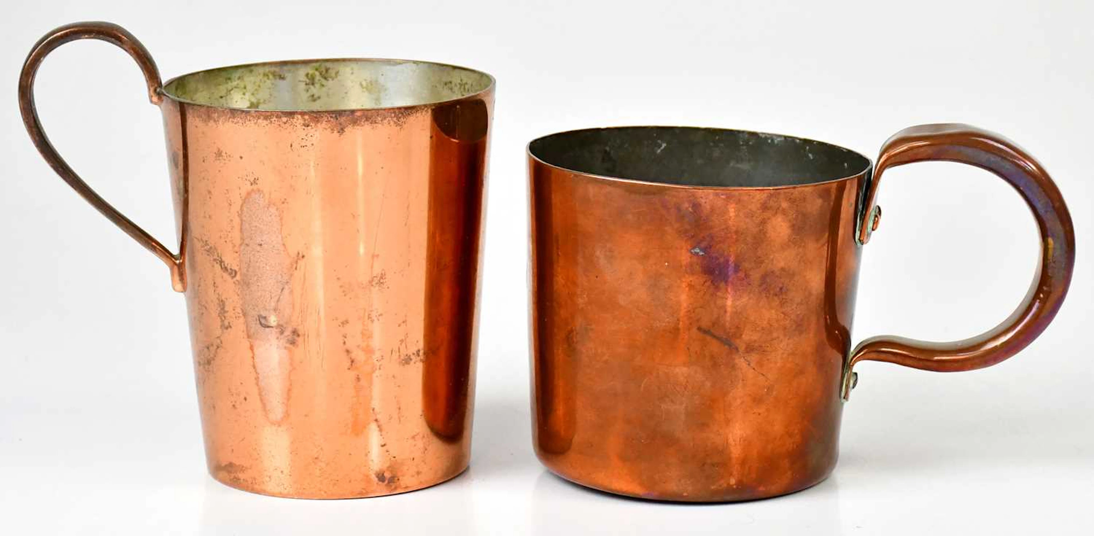 Two Georgian copper rum measures