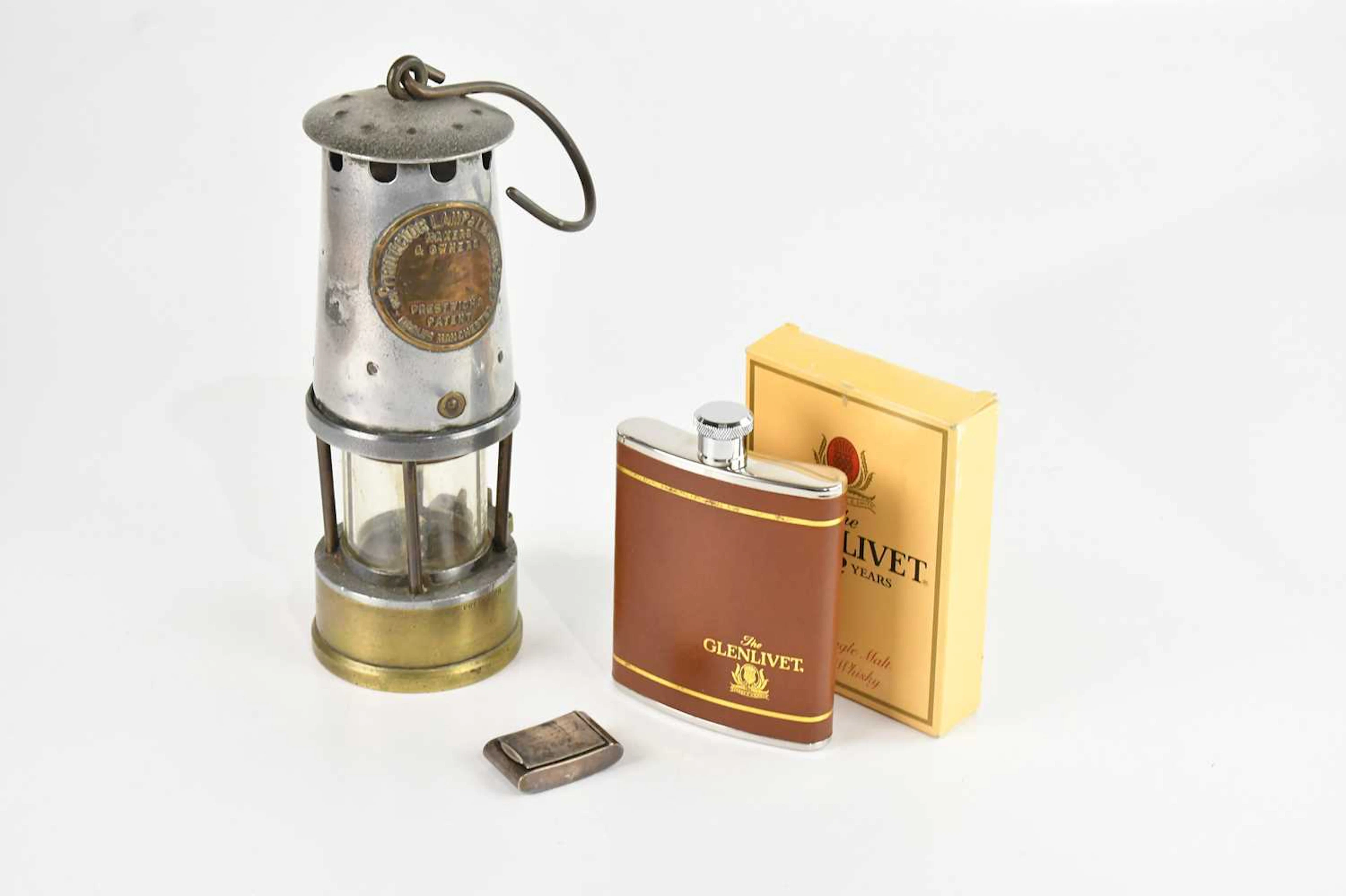 A small group of collector's items comprising a Protector...