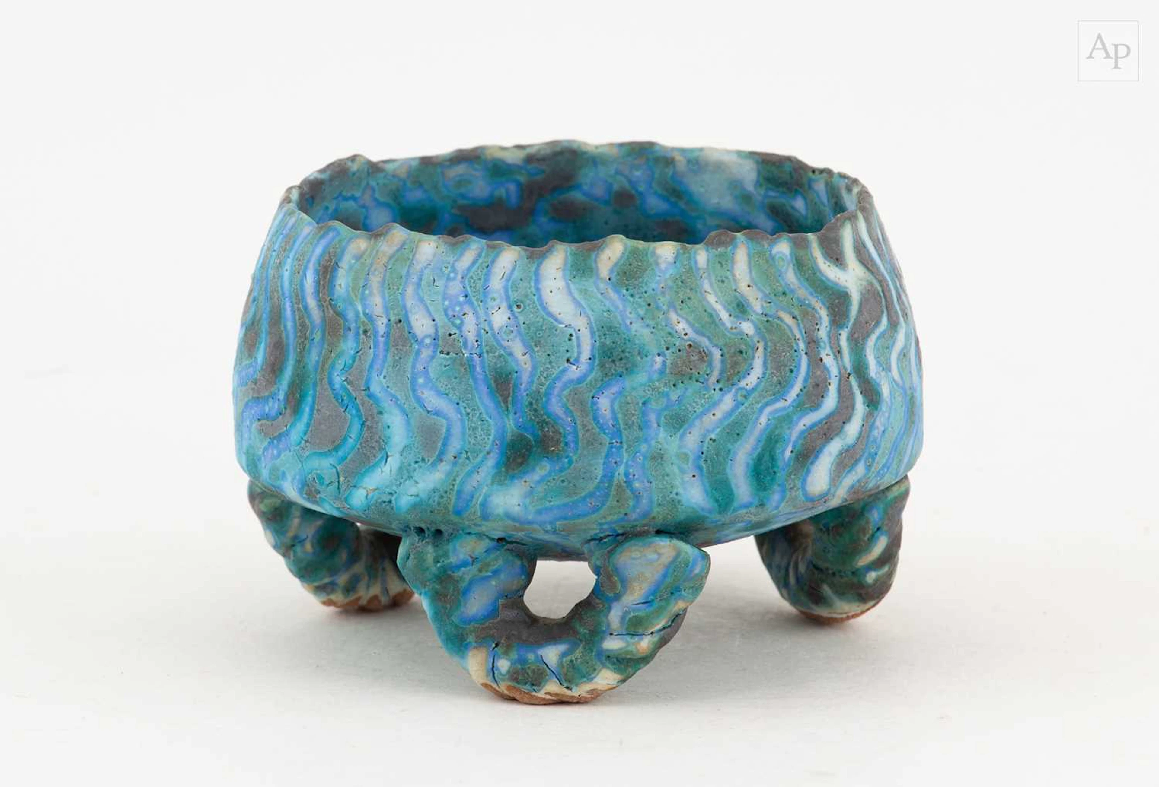 PETER BEARD (born 1951); a stoneware bowl on tripod feet...