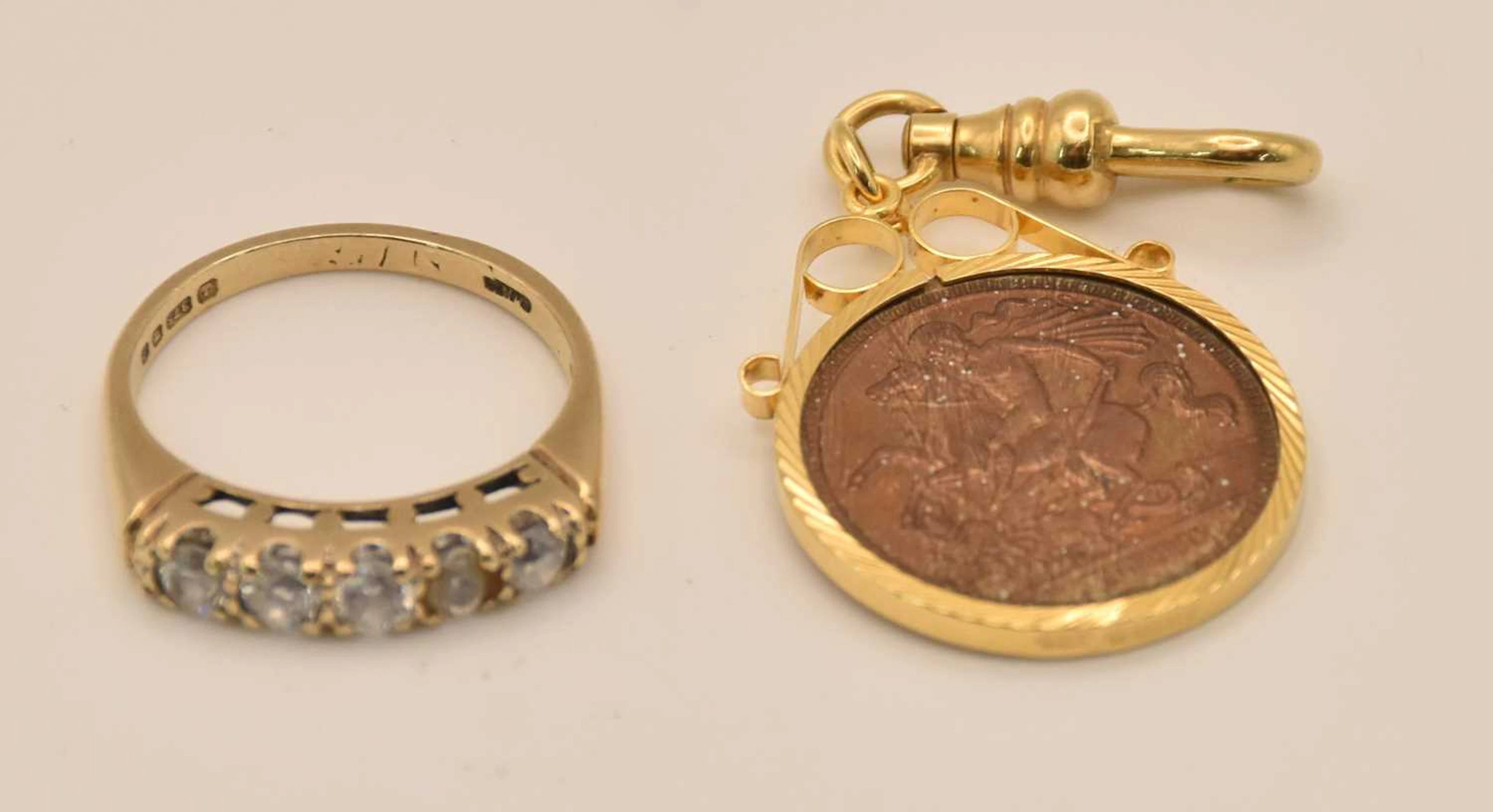 A 9ct yellow gold white stone set five stone ring