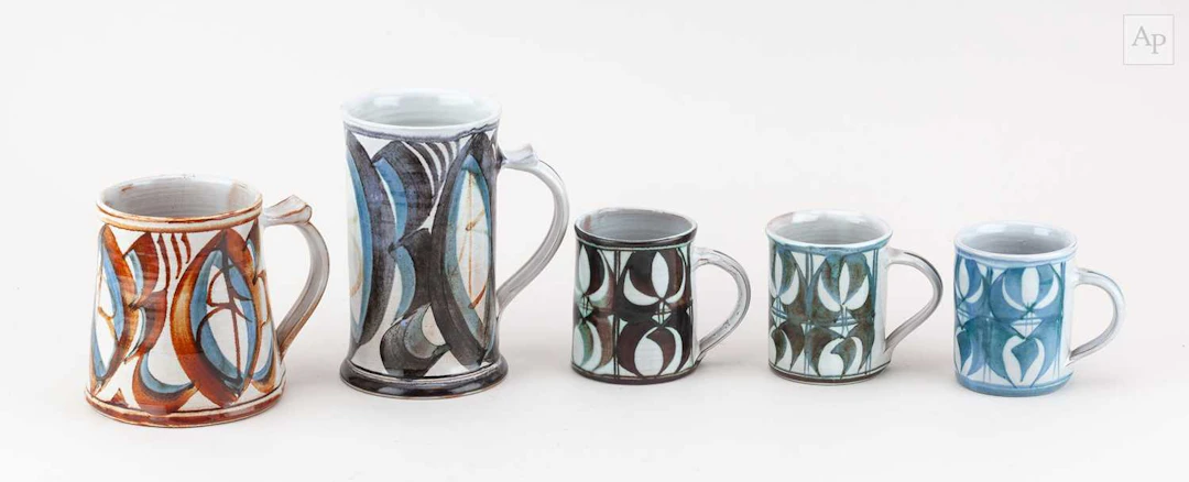 JULIAN BELLMONT for Aldermaston Pottery; a tall tin...