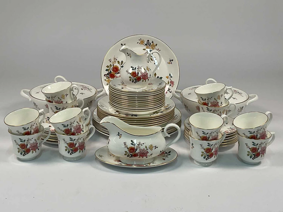 ROYAL ALBERT; a part dinner and tea service in the 'New Romance' pattern