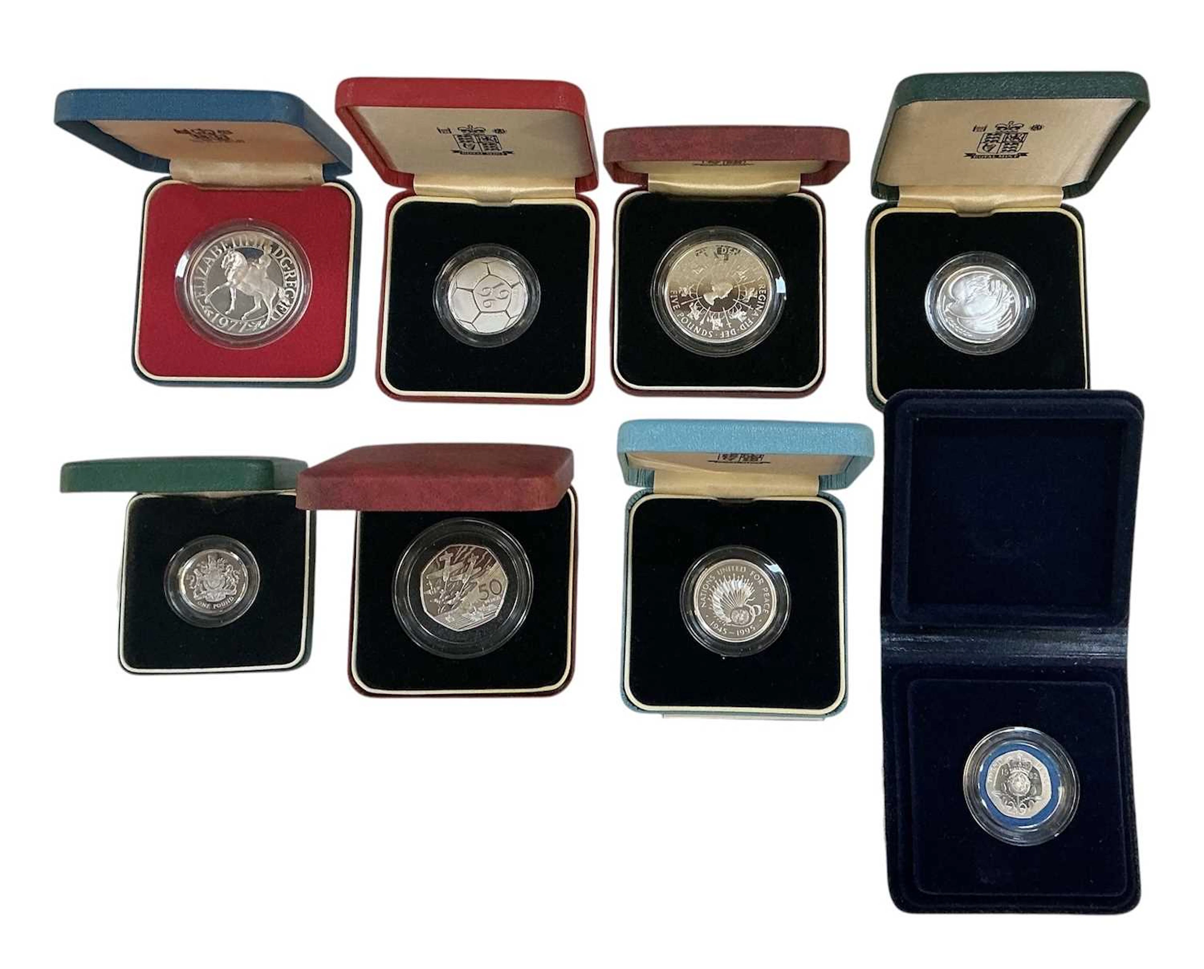 ROYAL MINT; eight assorted cased commemorative silver proof coins