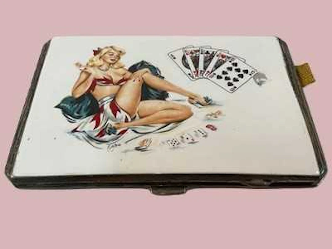 J COLLYER LTD; a George VI hallmarked silver and enamel cigarette case